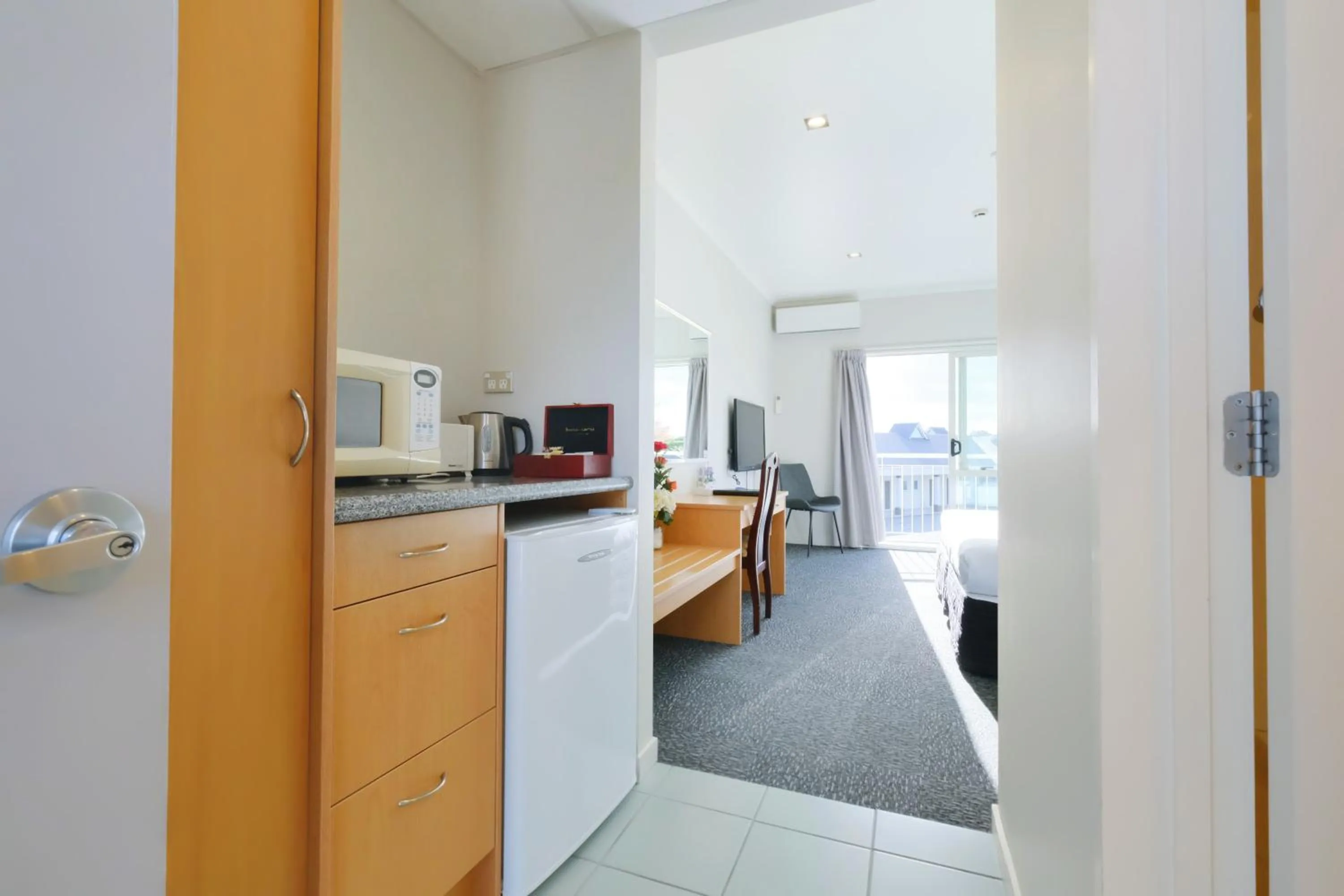 Kitchen or kitchenette in The Garden Hotel