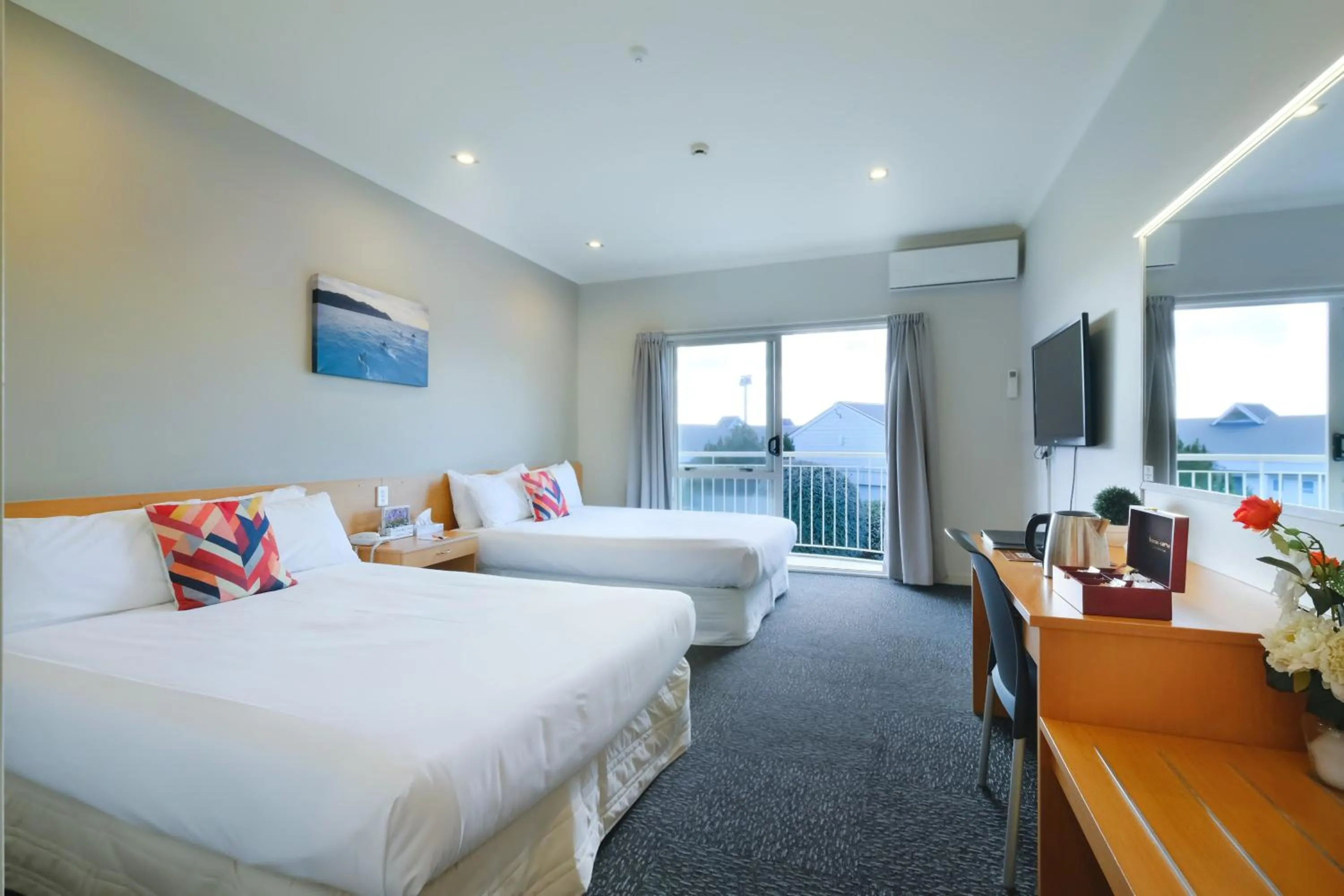 Bed in The Garden Hotel