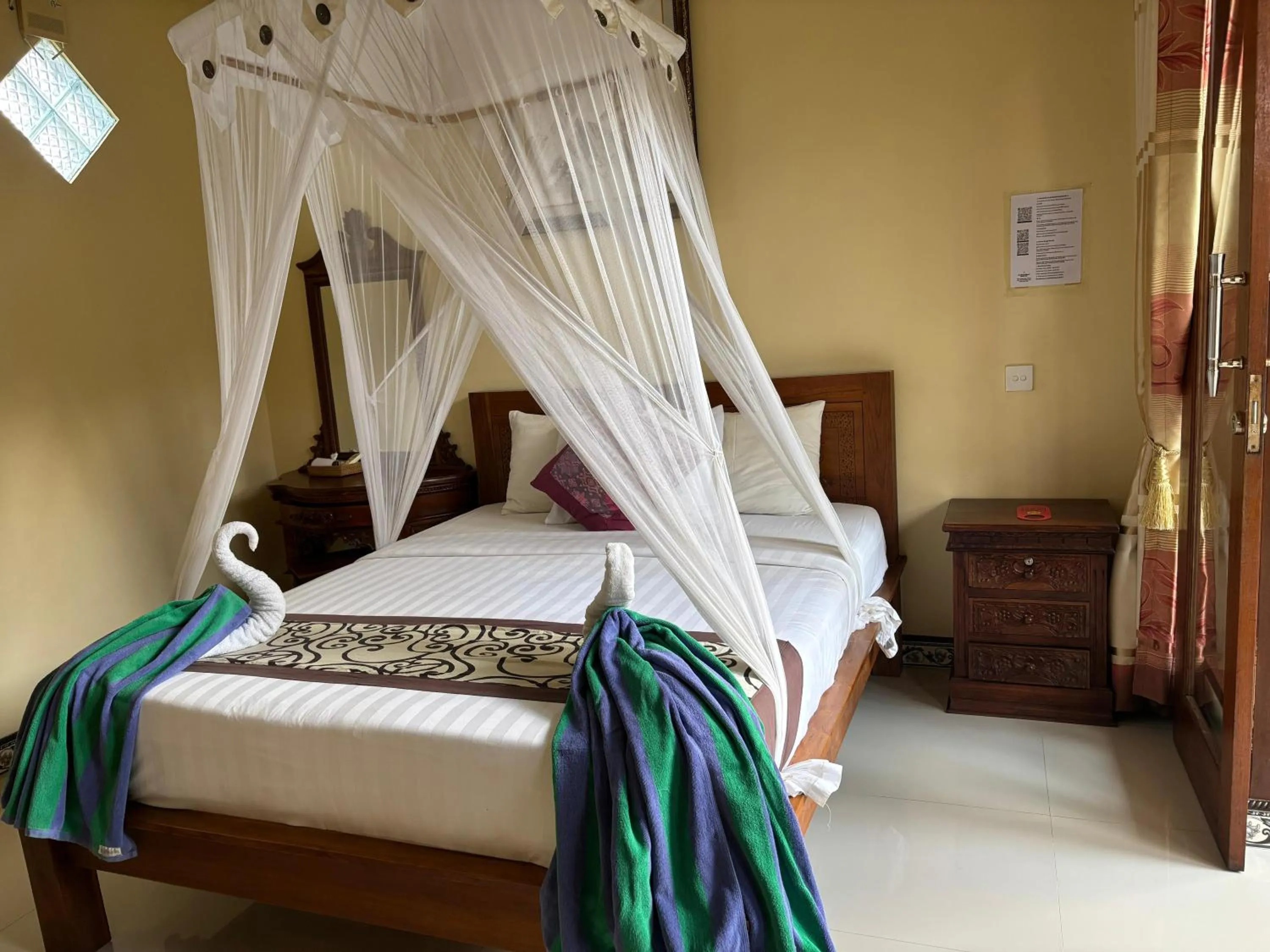 Bed in Suparsa's Homestay