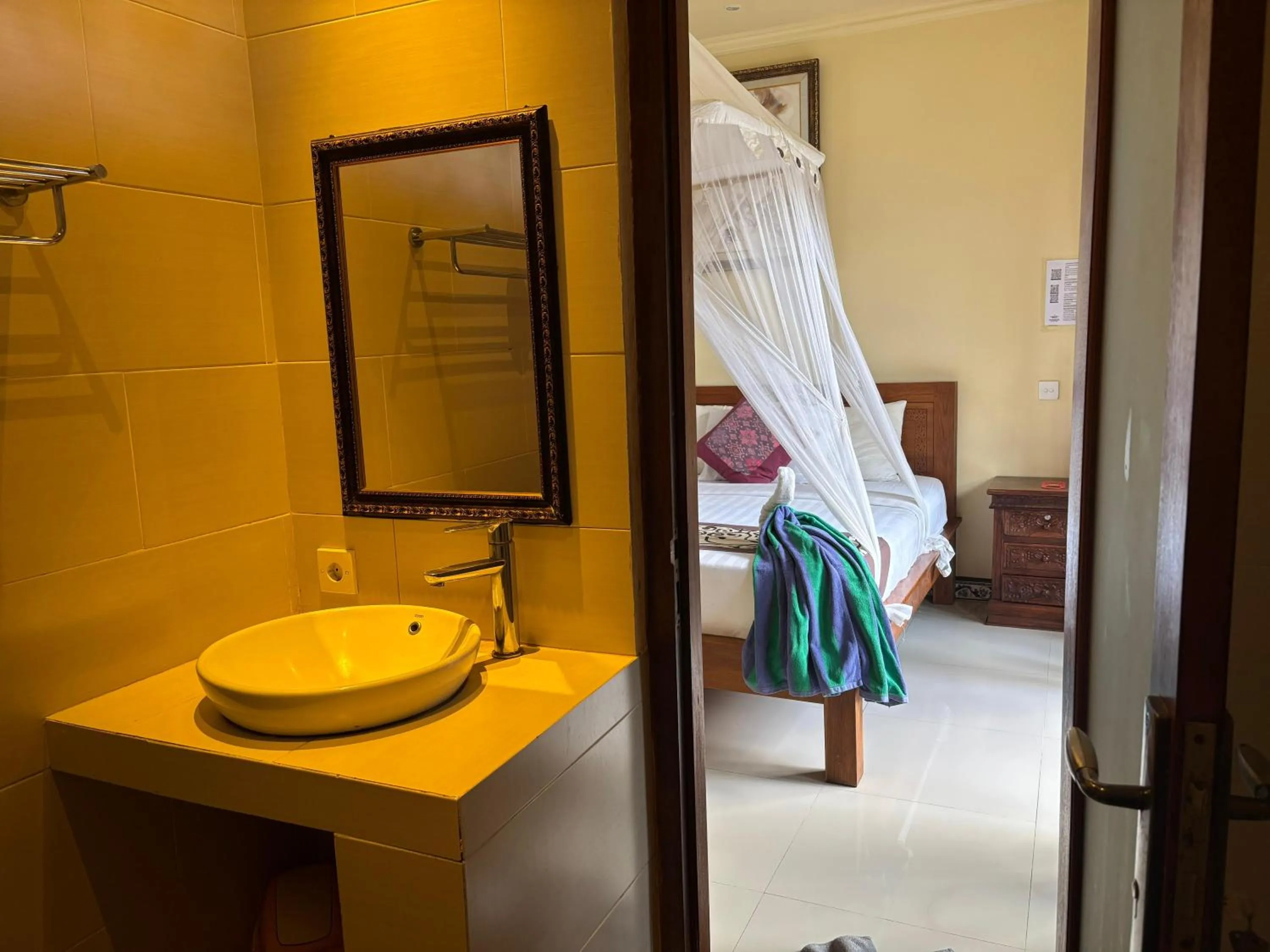 Bed in Suparsa's Homestay