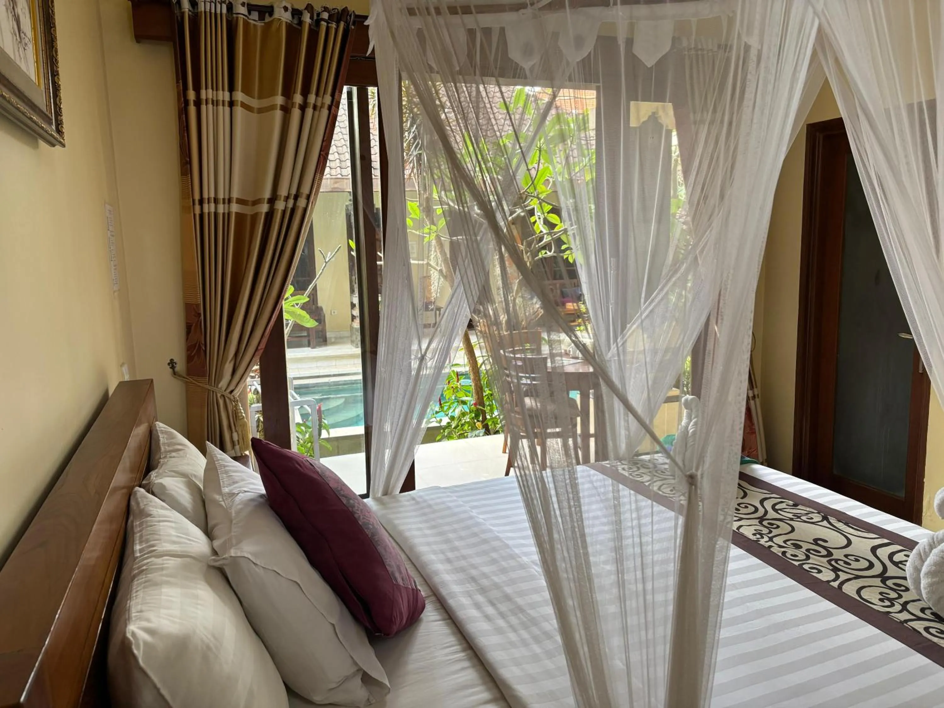 Bed in Suparsa's Homestay