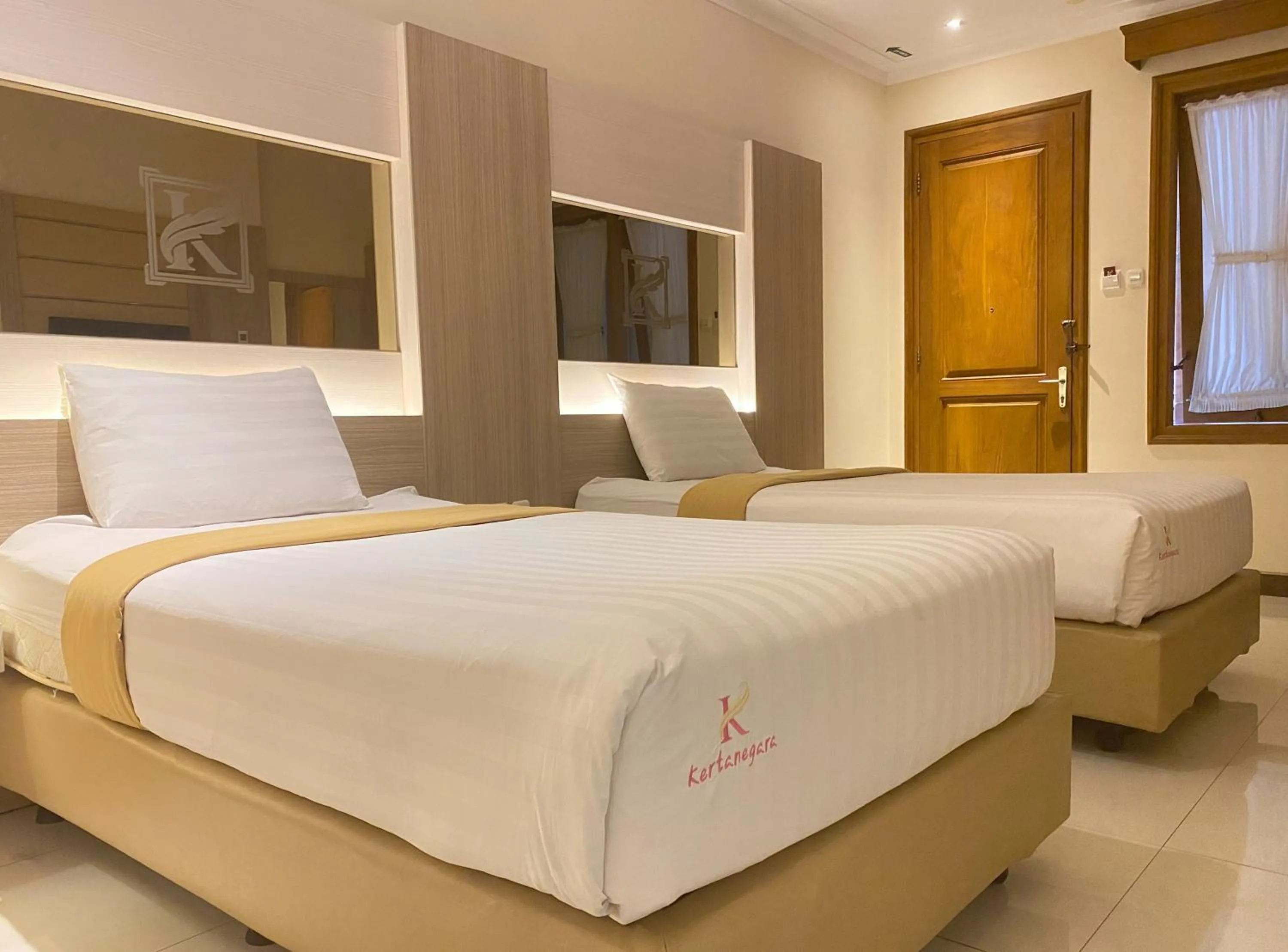 Bed in Kertanegara Premium Guest House