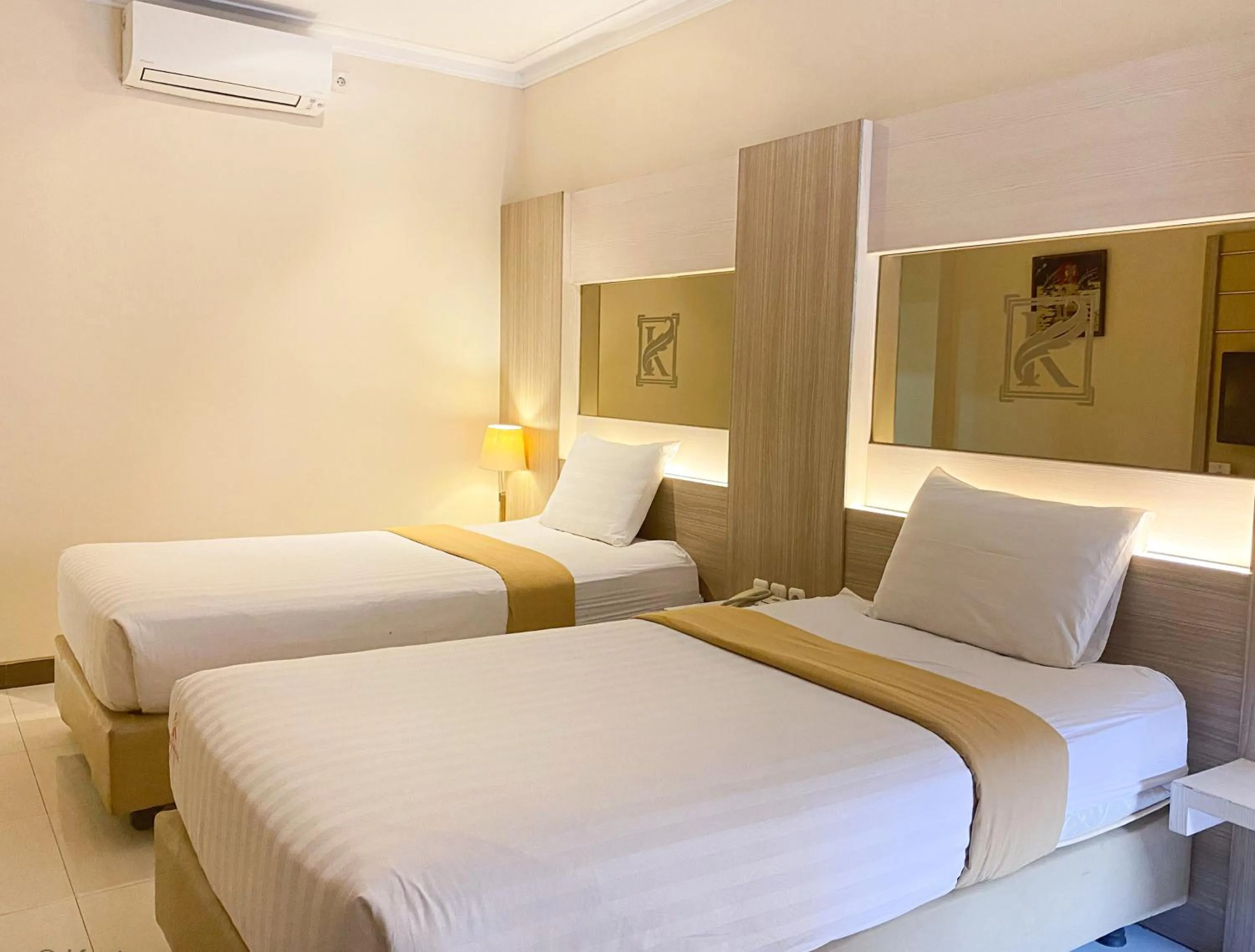 Bed in Kertanegara Premium Guest House