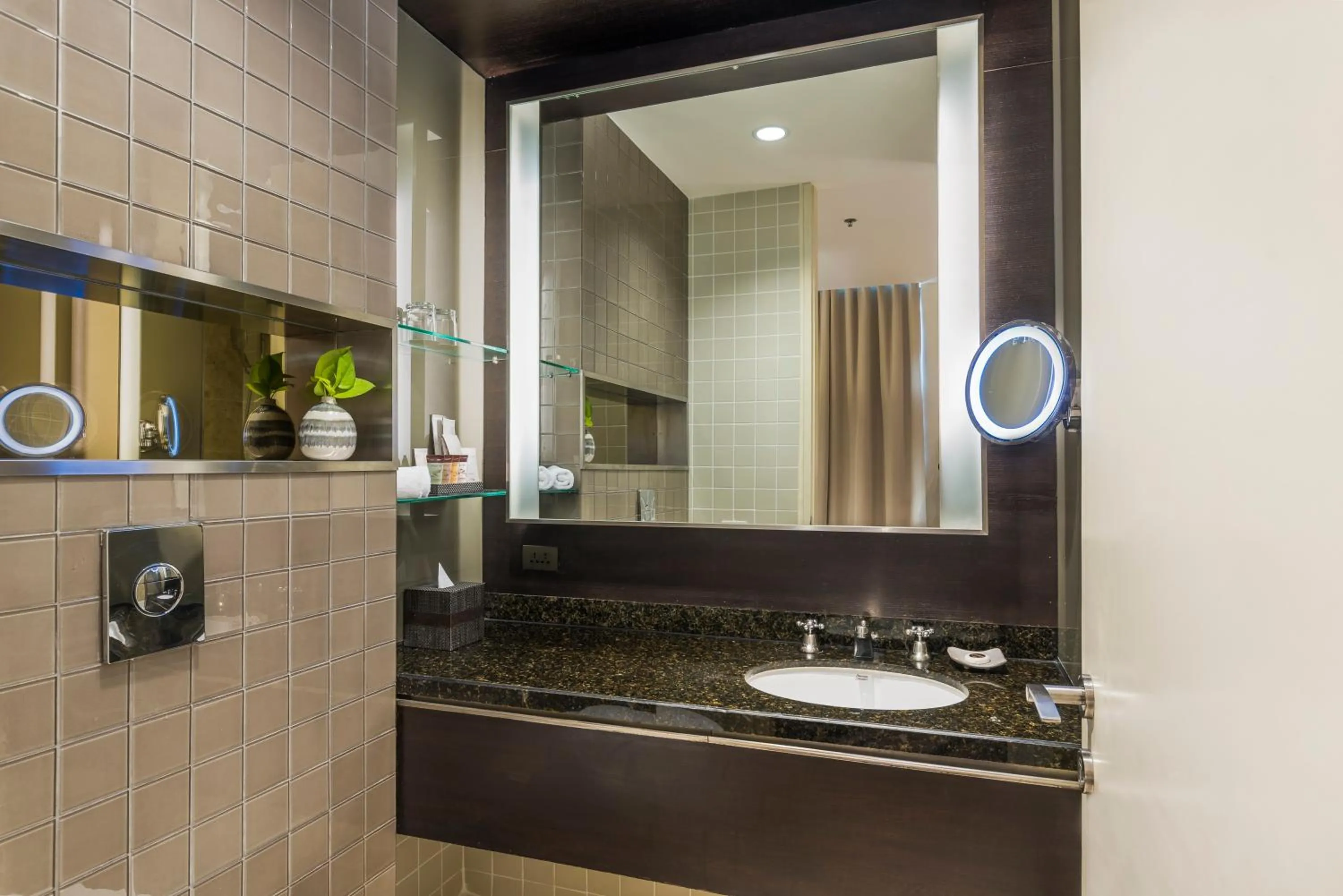 Bathroom in Emporium Suites by Chatrium