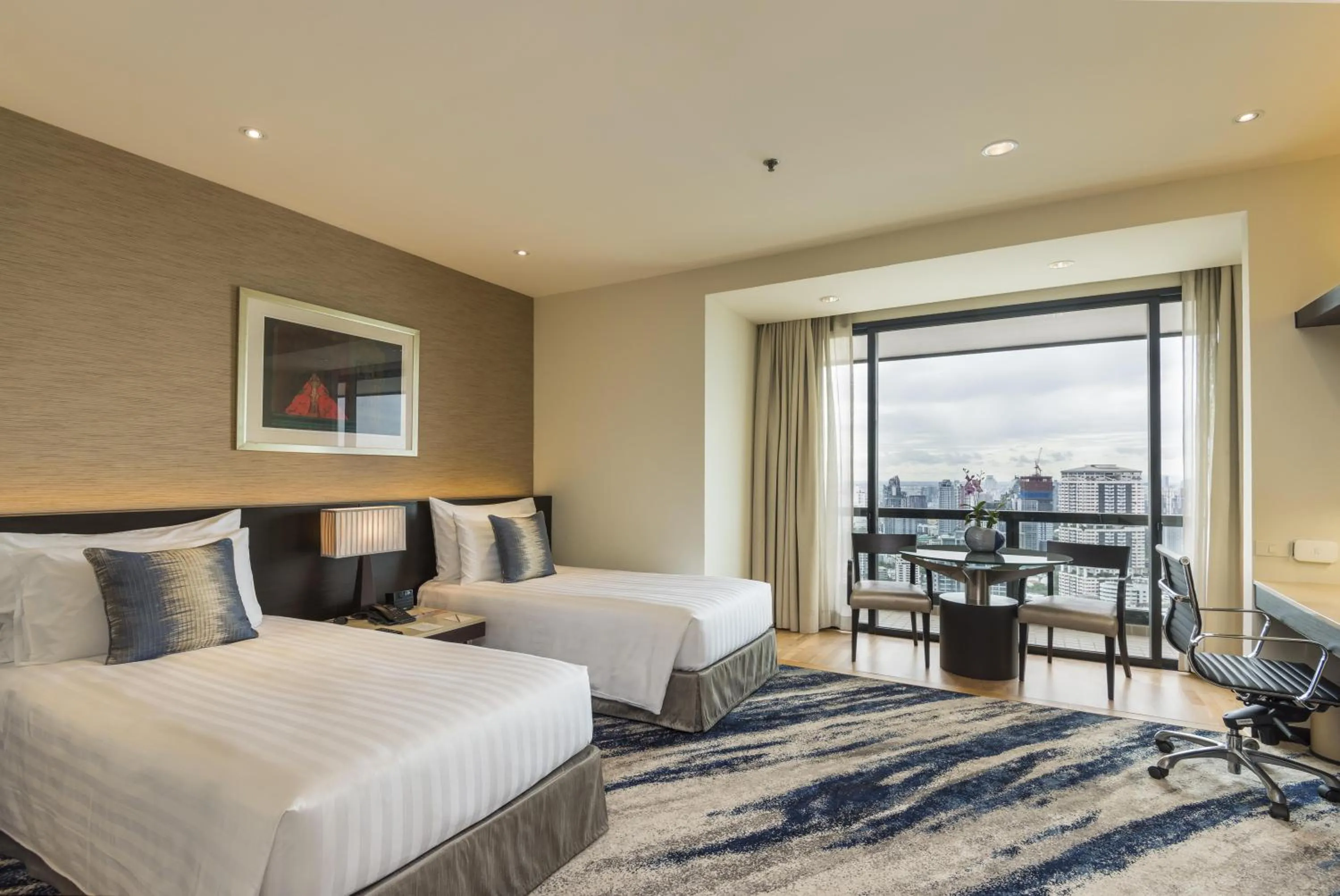 Bed in Emporium Suites by Chatrium