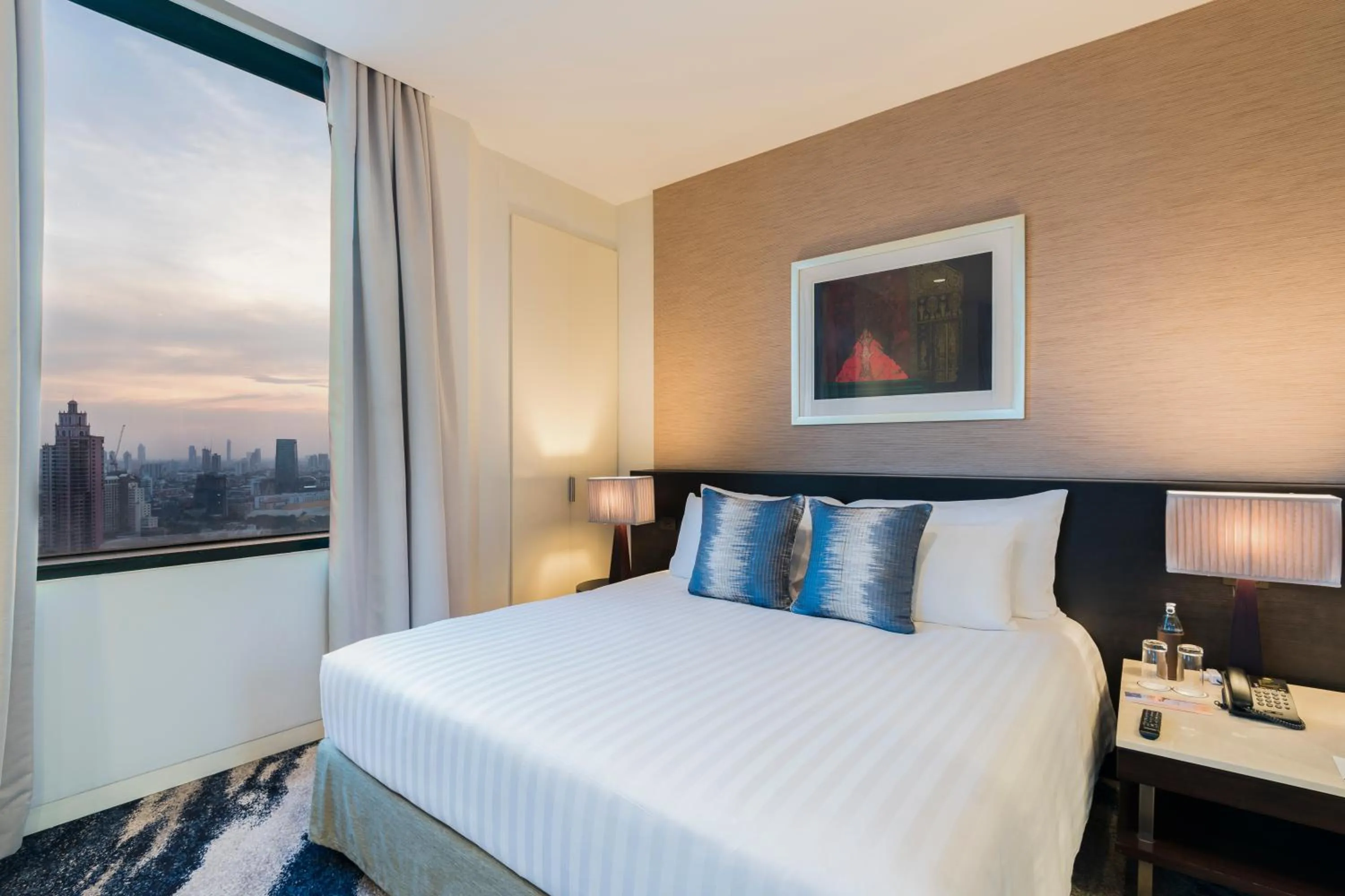 Bed in Emporium Suites by Chatrium