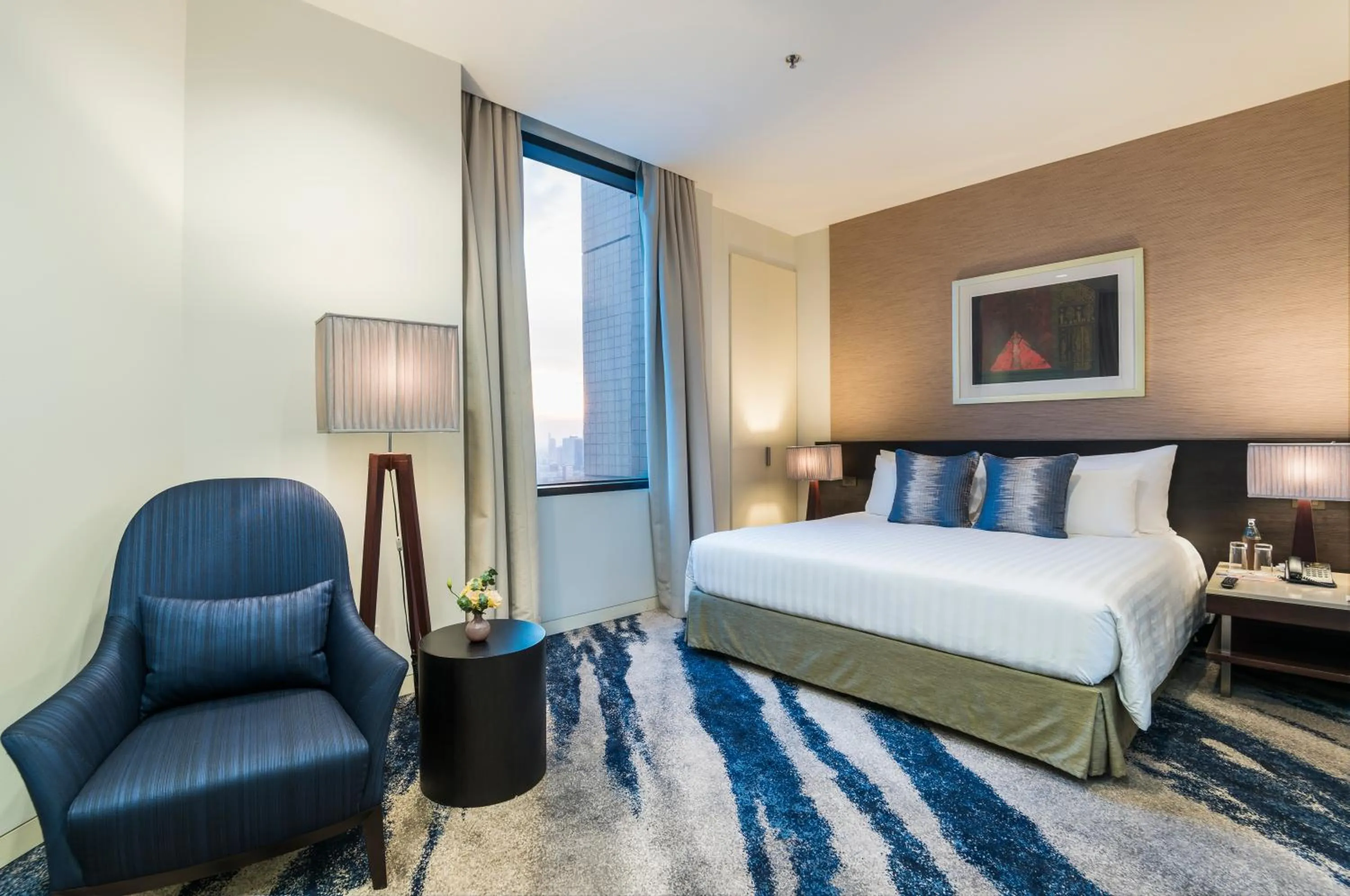 Bed in Emporium Suites by Chatrium