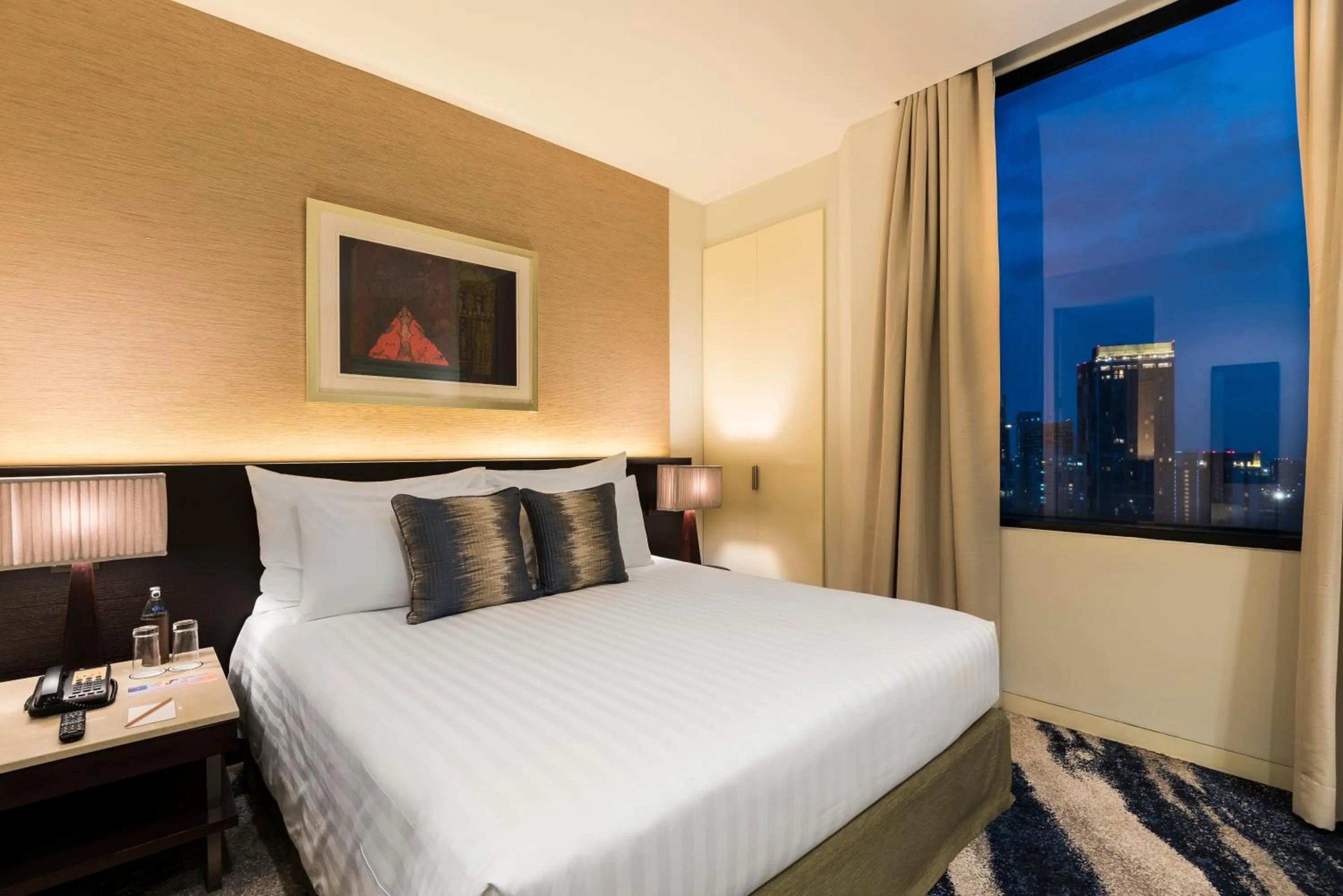 Bed in Emporium Suites by Chatrium