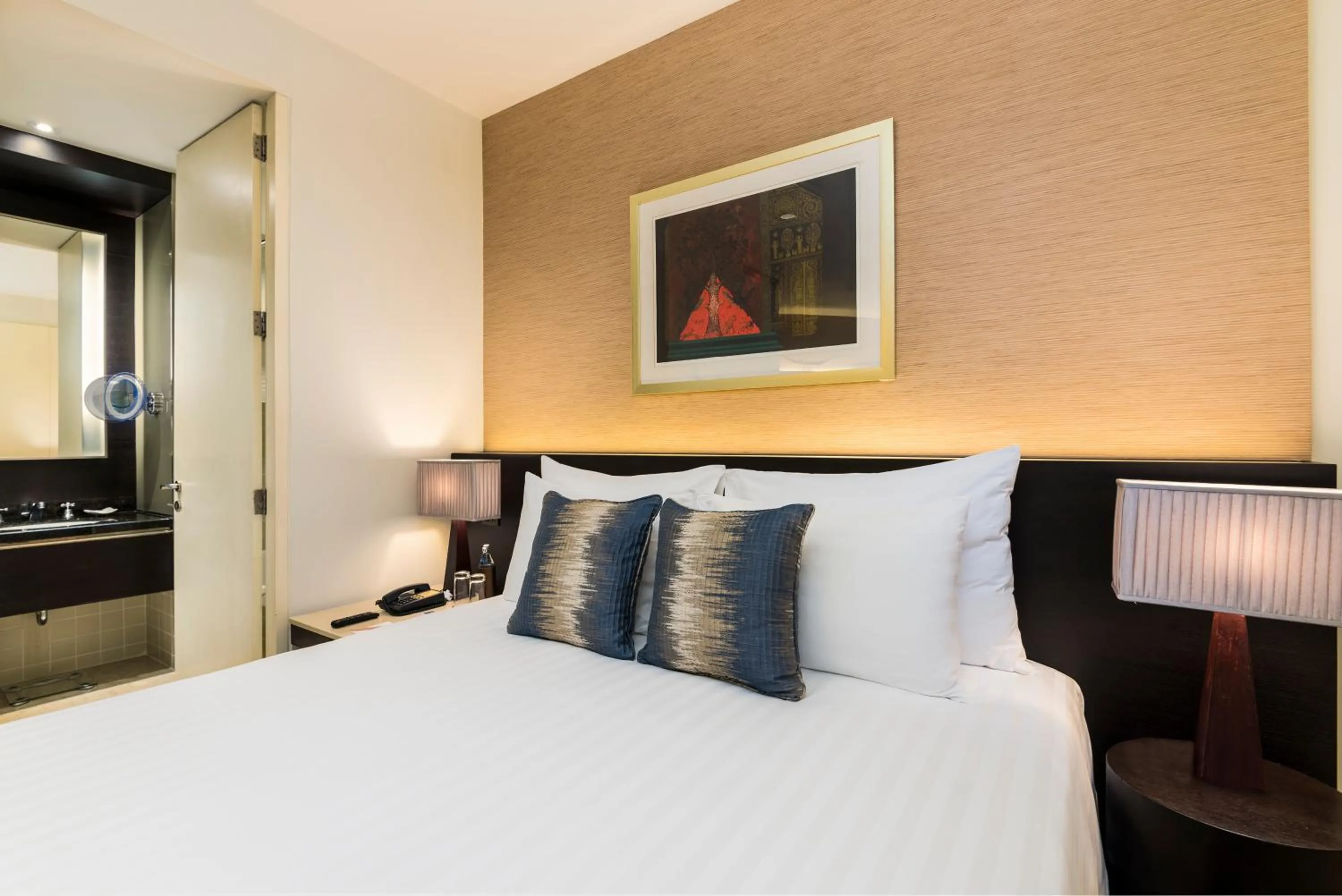 Bed in Emporium Suites by Chatrium