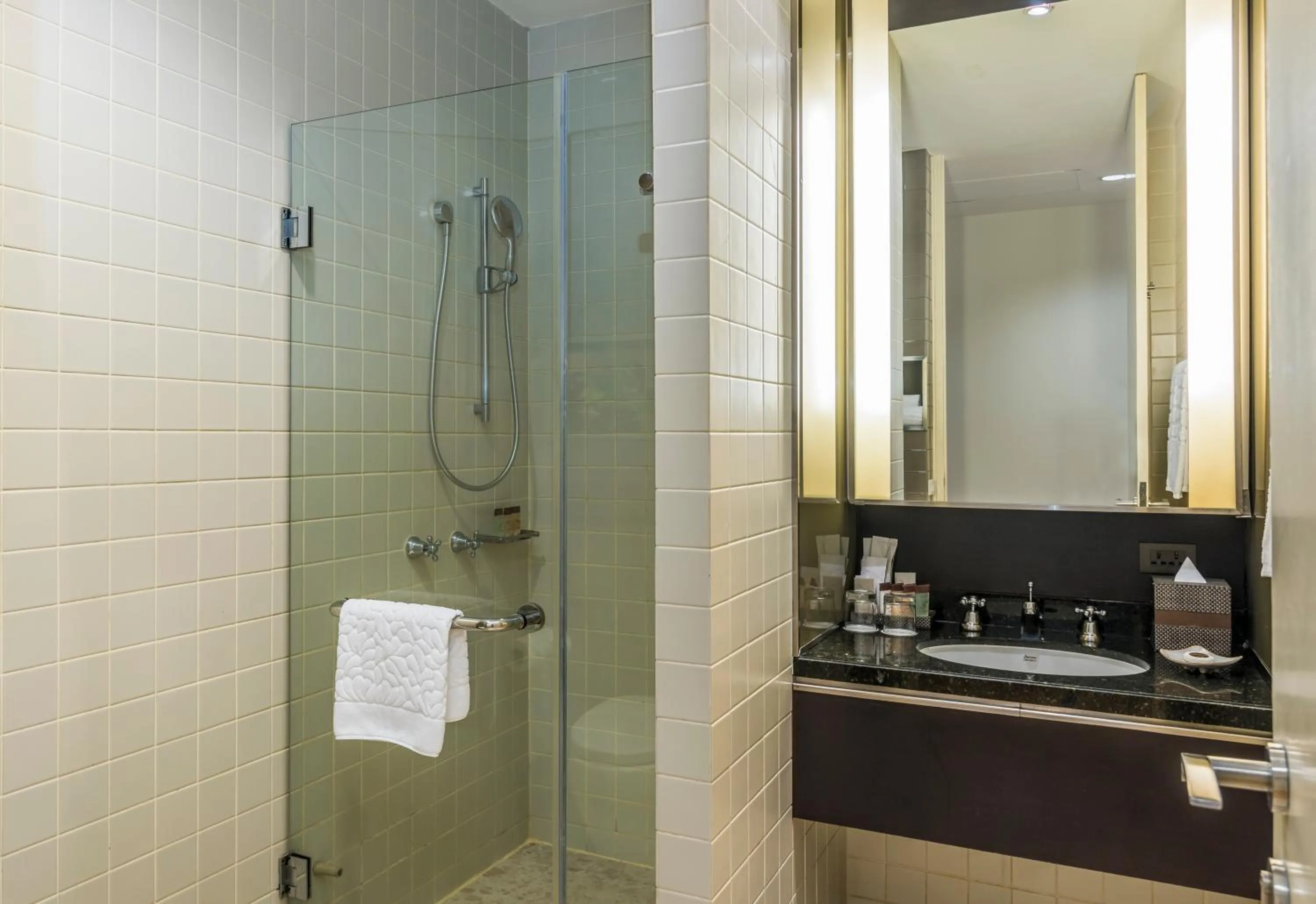 Toilet in Emporium Suites by Chatrium