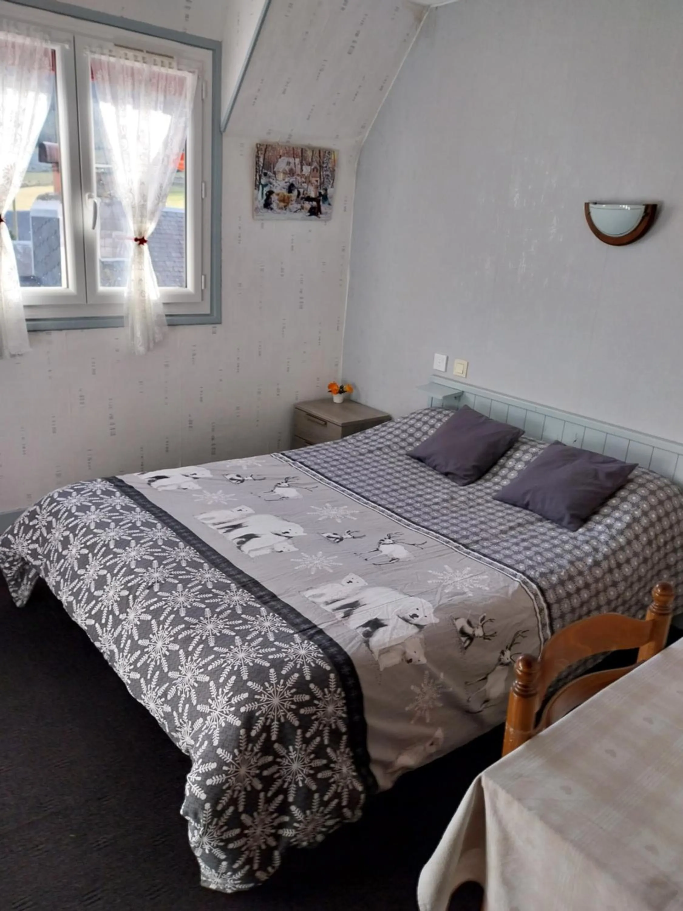 Bed in Hôtel les Deux Cols