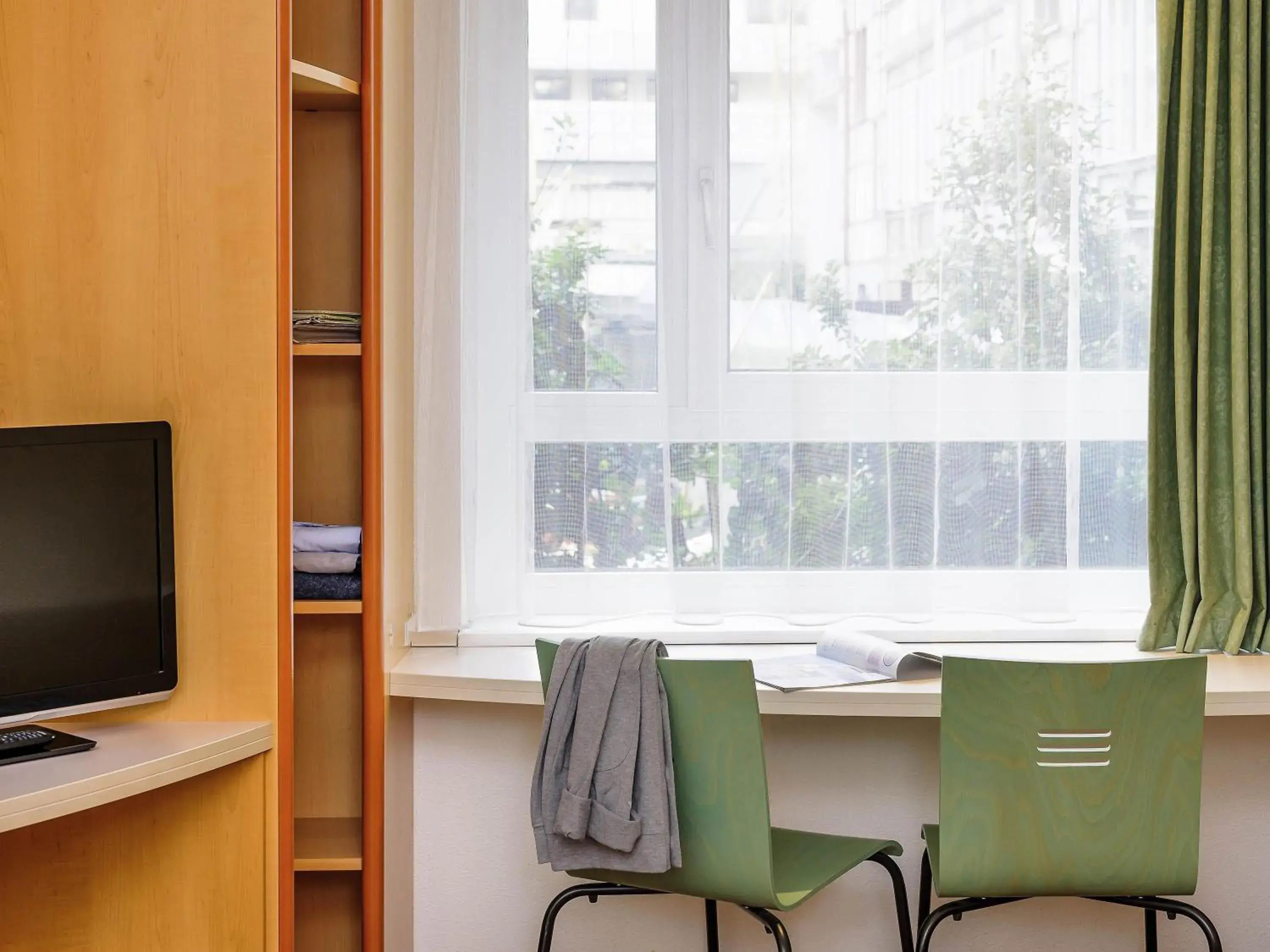 Bedroom in Hotel Ibis Bregenz Bedroom in Hotel Ibis Bregenz