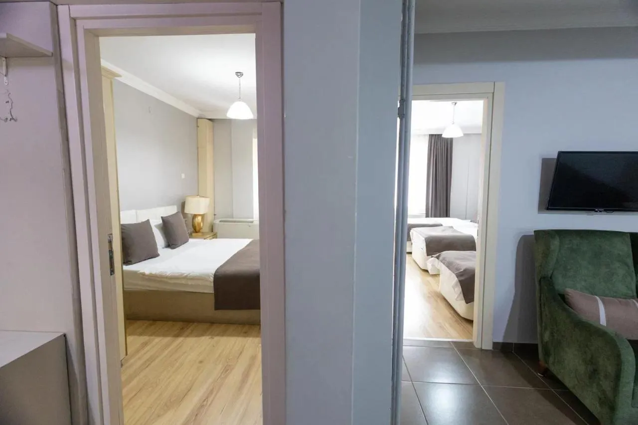 Communal lounge/ TV room, Bed in Ottoman Palace Hotel Edirne