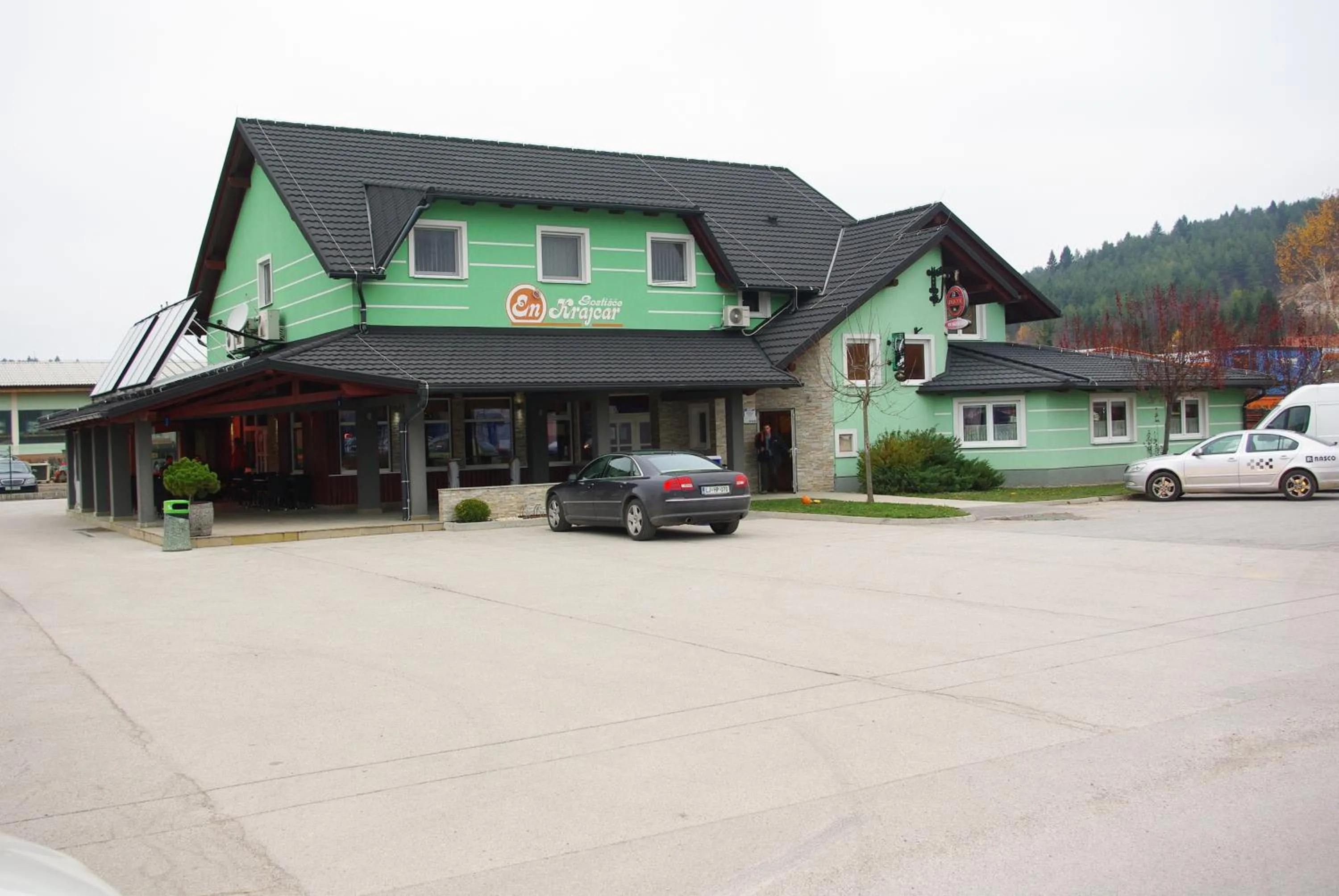 Property building in Rooms En Krajcar