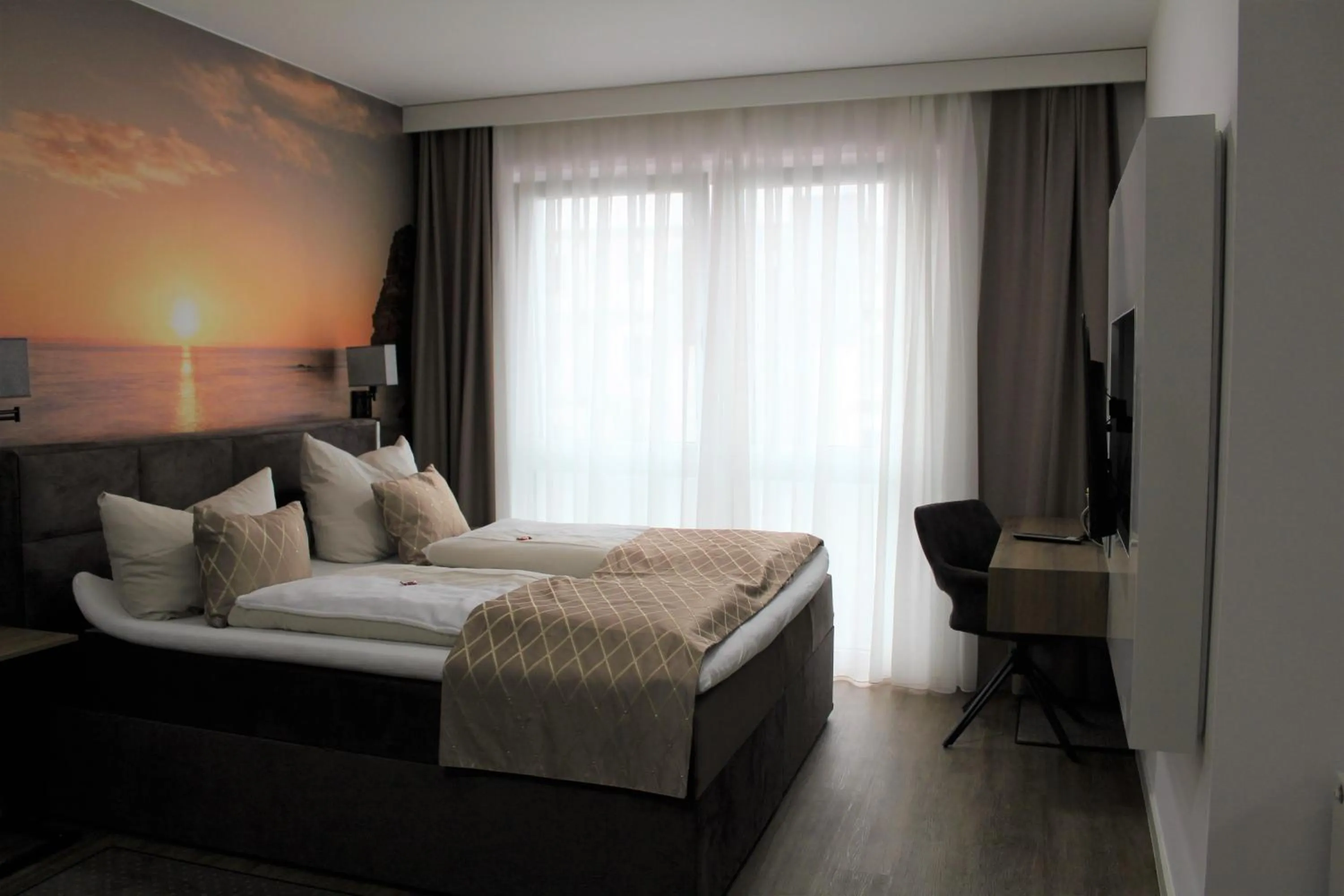 Photo of the whole room, Bed in Hotel Ammerländer Hof