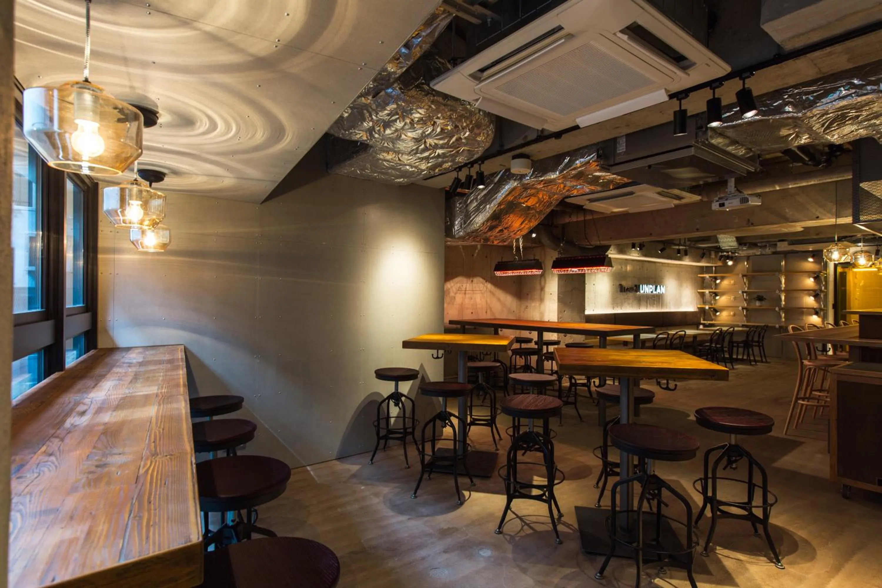 Communal lounge/ TV room in UNPLAN Shinjuku