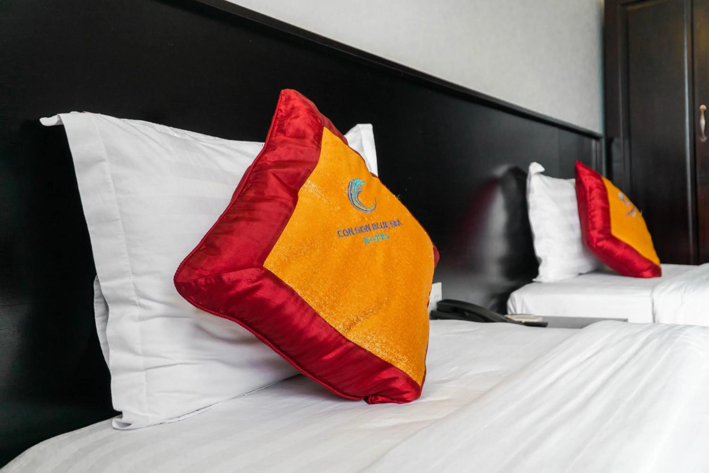 Bed in Con Son Blue Sea Hotel