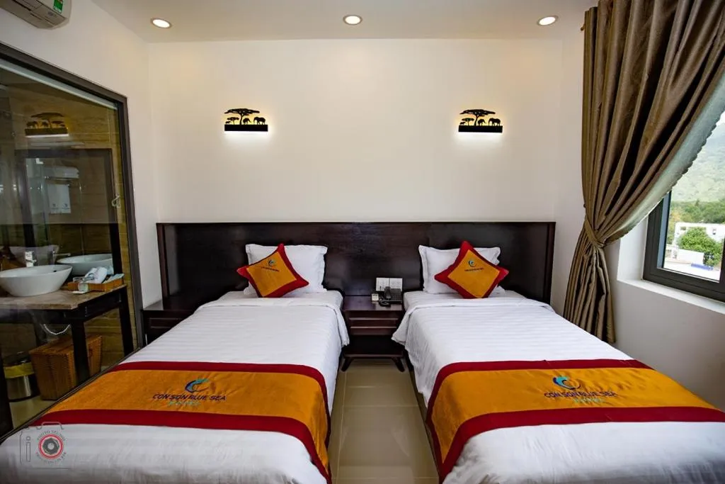Bed in Con Son Blue Sea Hotel