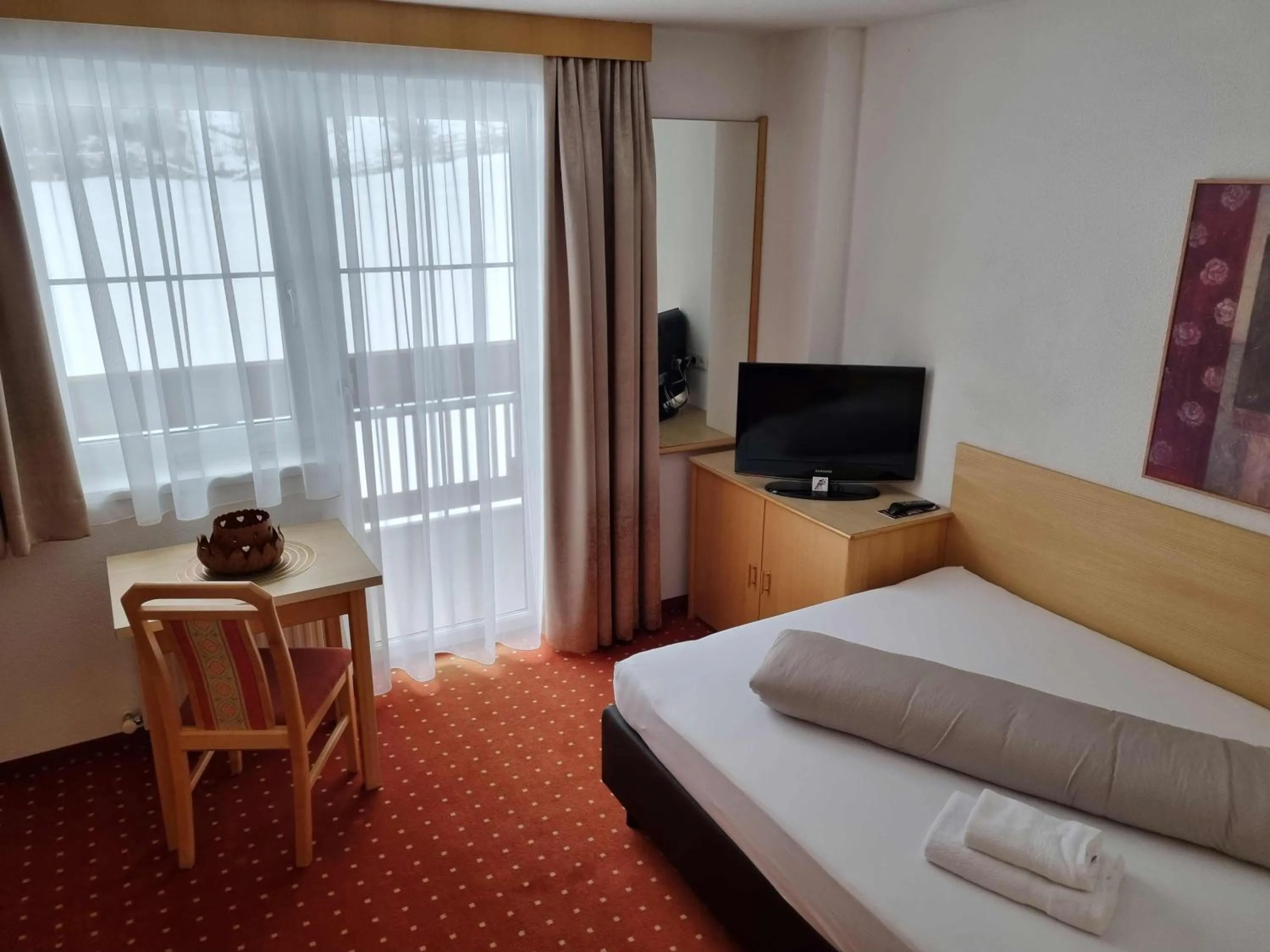 Bed in Hotel Garni Corinna