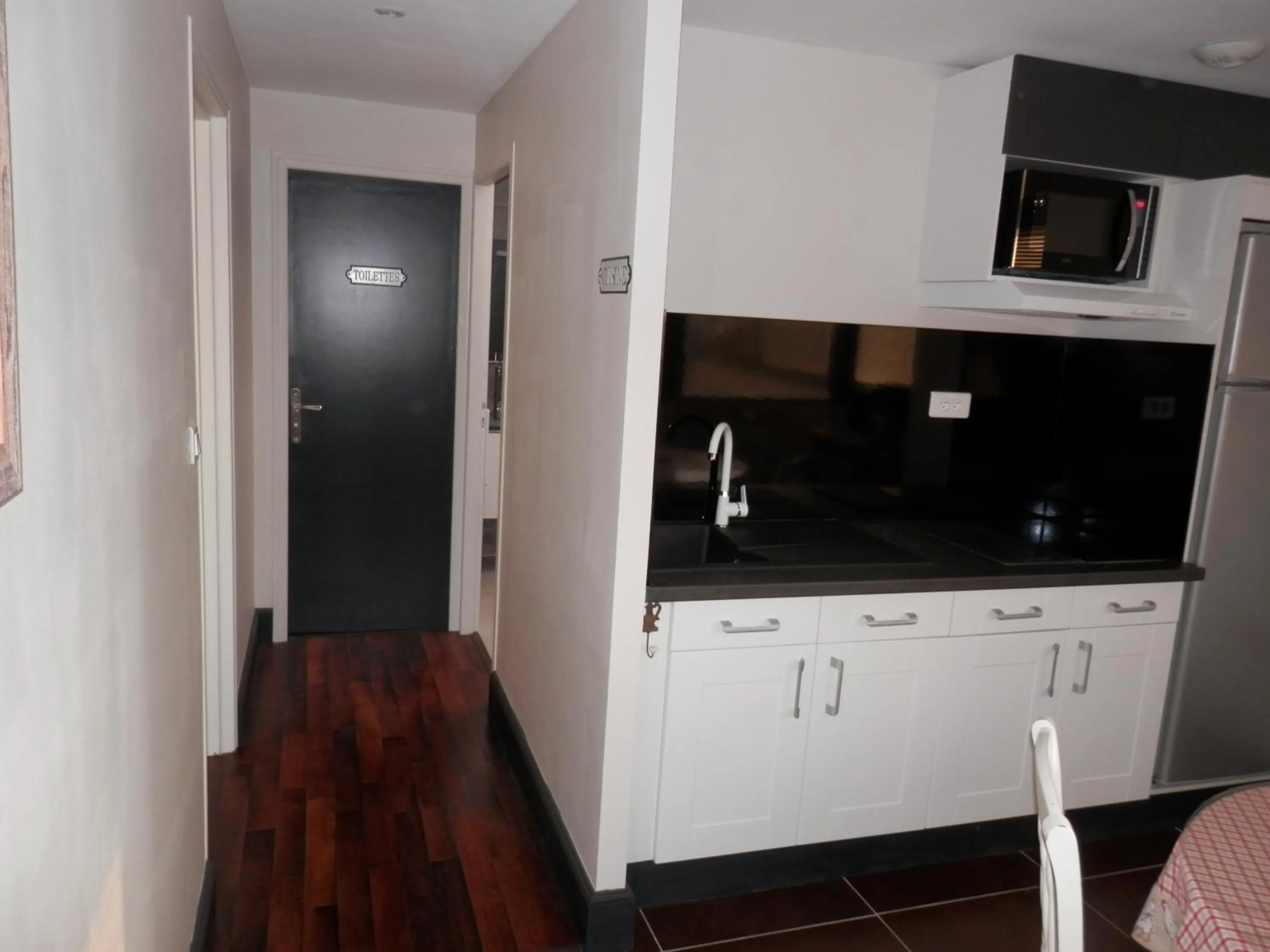 Kitchen or kitchenette in Appart-hôtel Chanzy / Angoulême