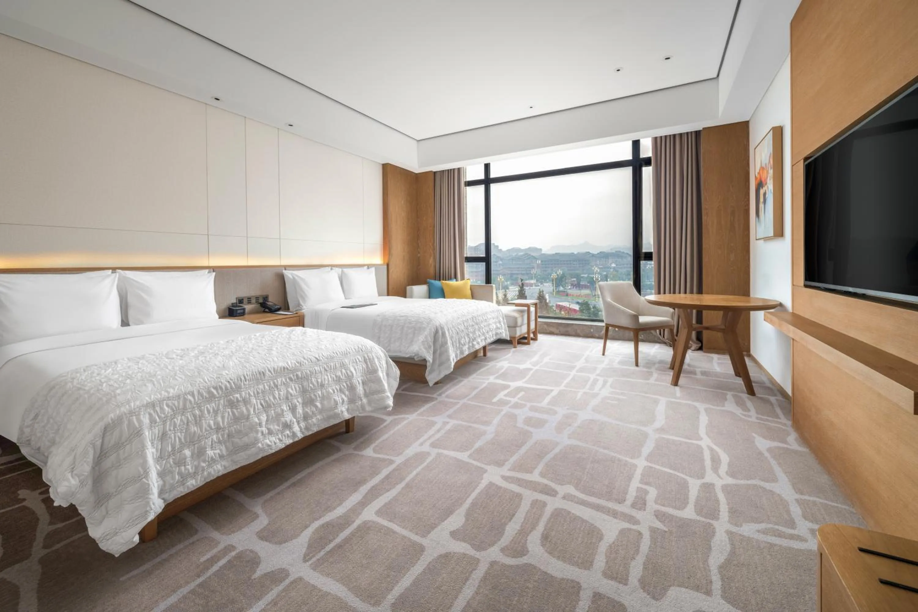 Bed in Le Meridien Emei Mountain Resort