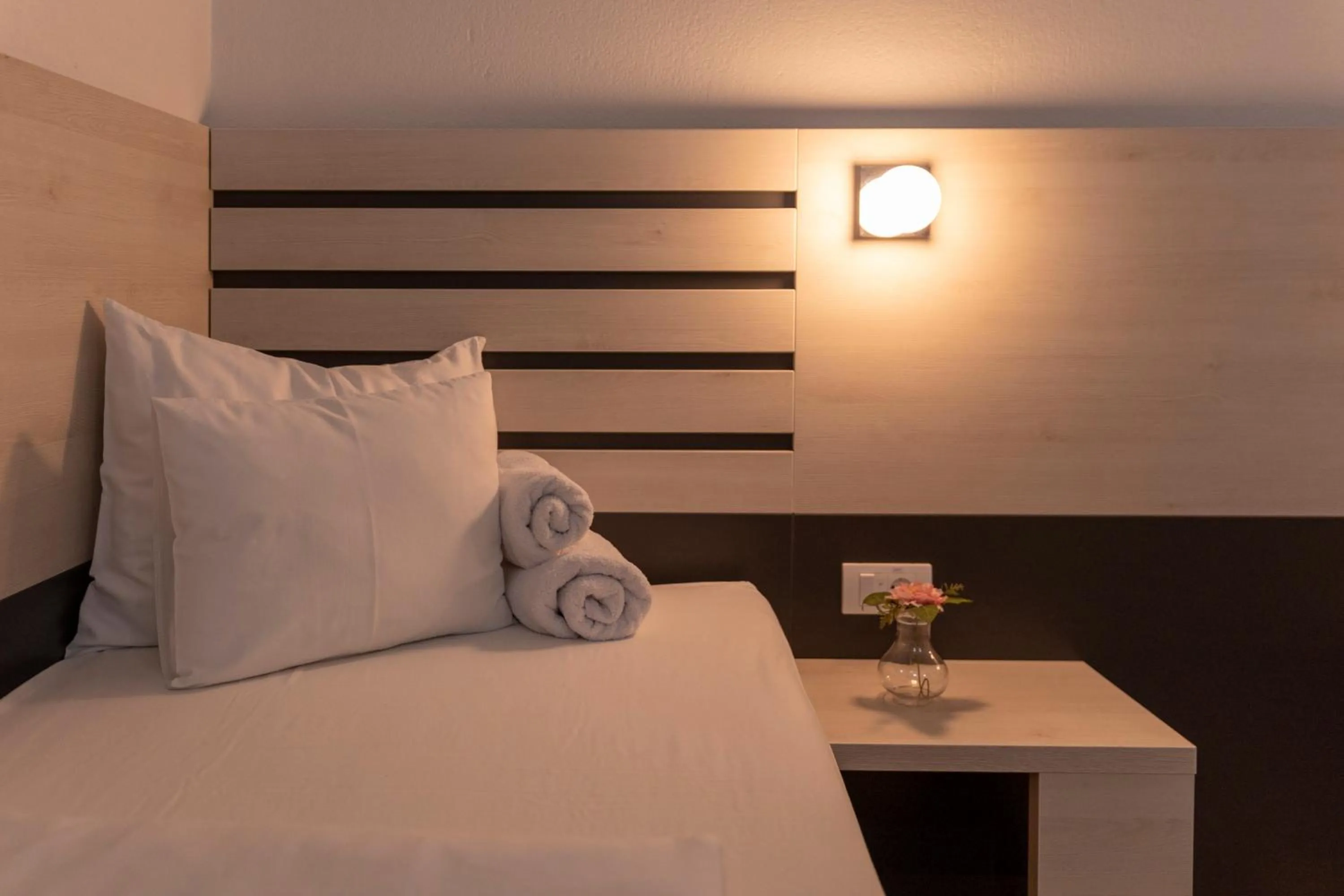 Bed in Garni Hotel 11tica DM