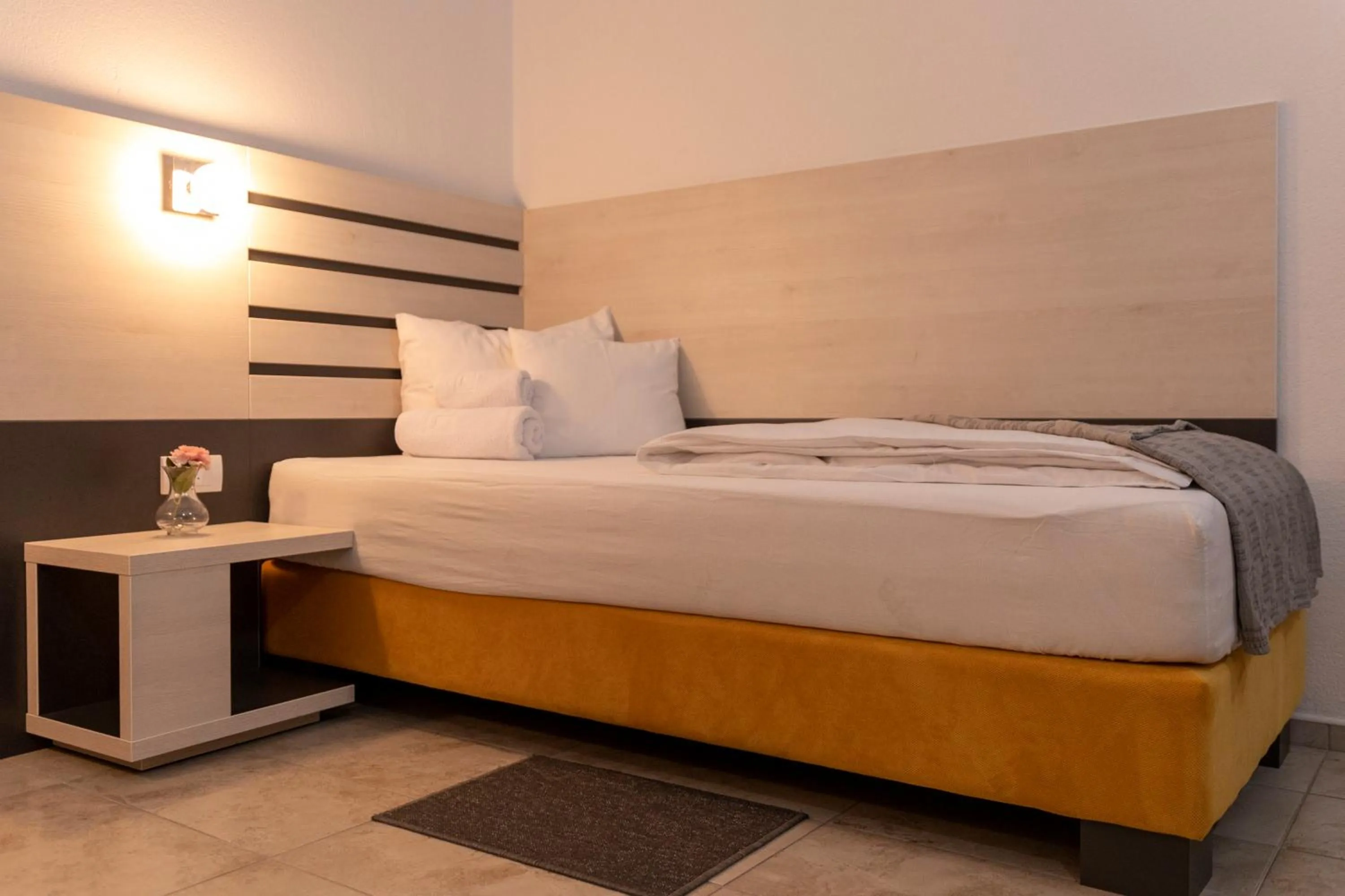 Bed in Garni Hotel 11tica DM