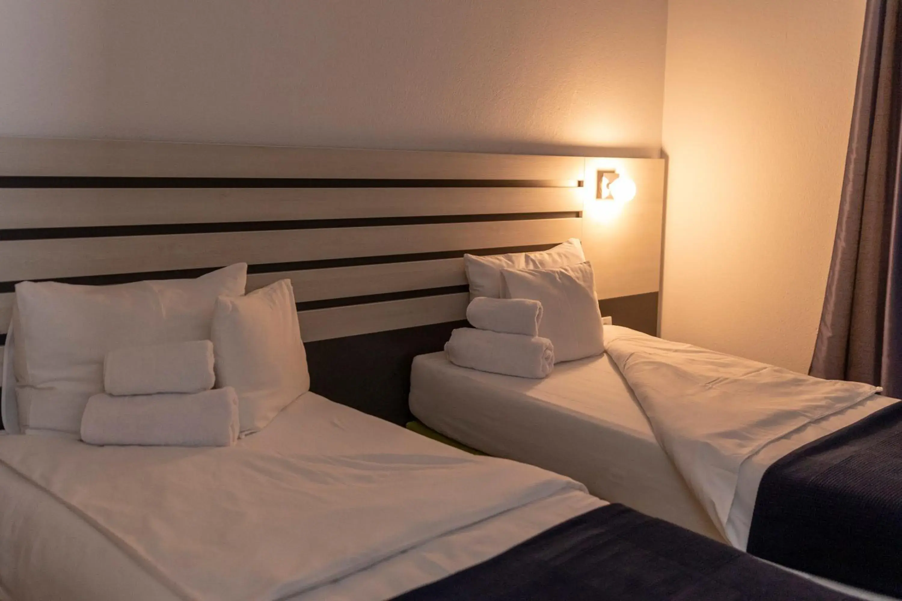 Standard Triple Room in Garni Hotel 11tica DM Standard Triple Room in Garni Hotel 11tica DM