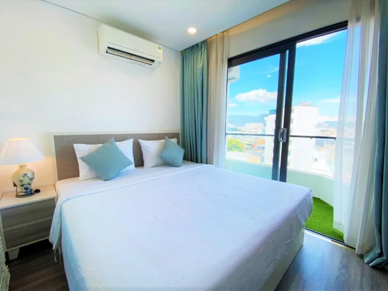 Bed in Olivia Hotel and Apartment