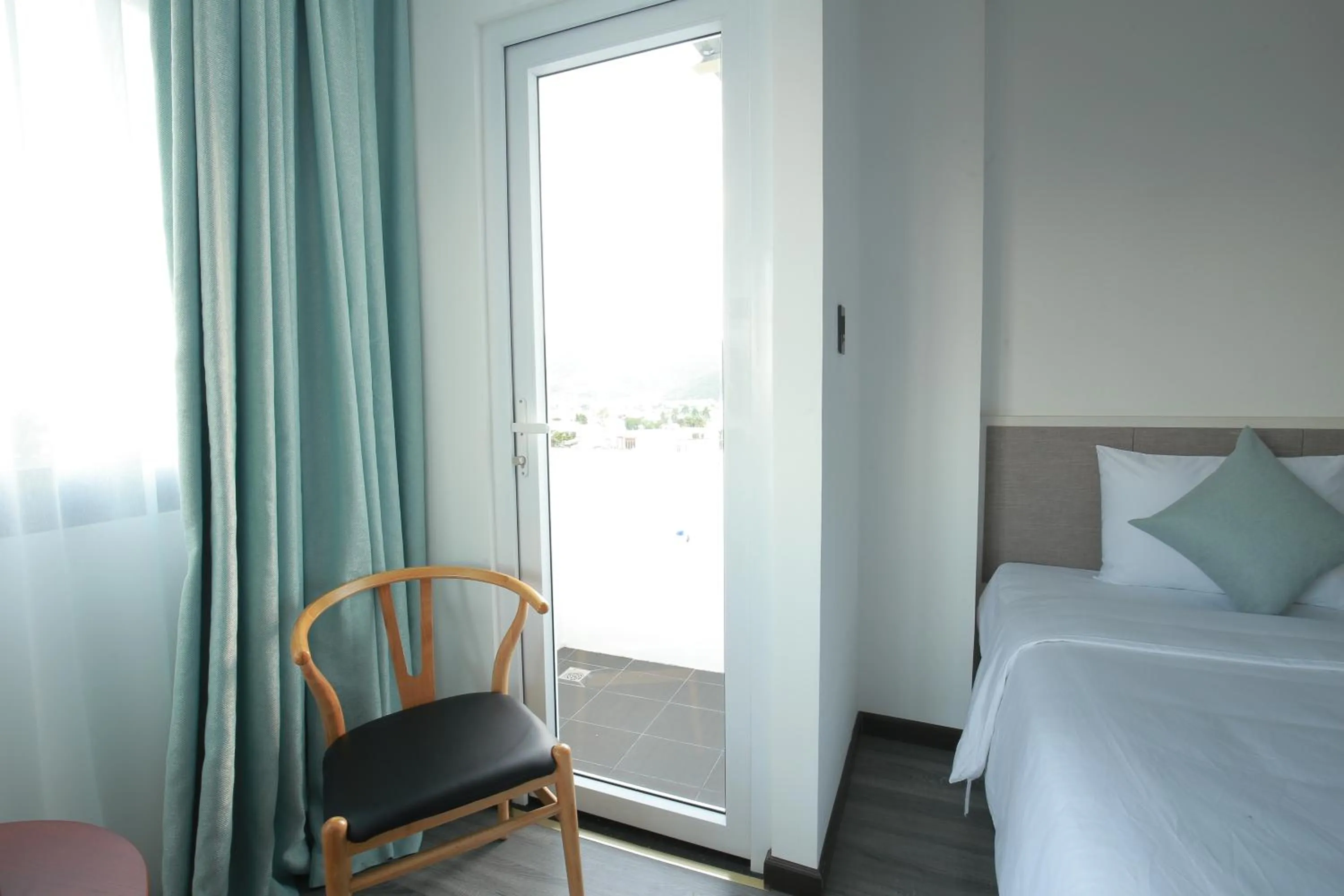 Bed in Olivia Hotel and Apartment