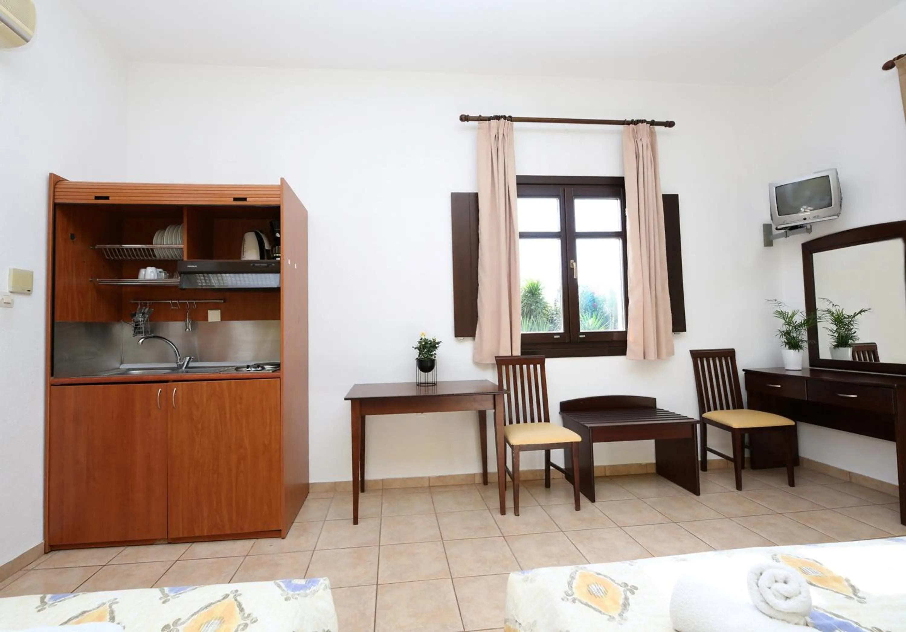 kitchen in Palirria Hotel & Studios