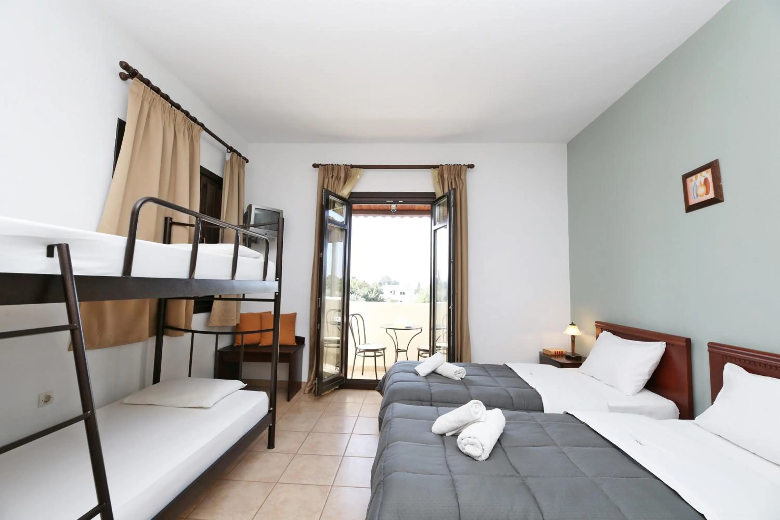 Balcony/Terrace, Bed in Palirria Hotel & Studios