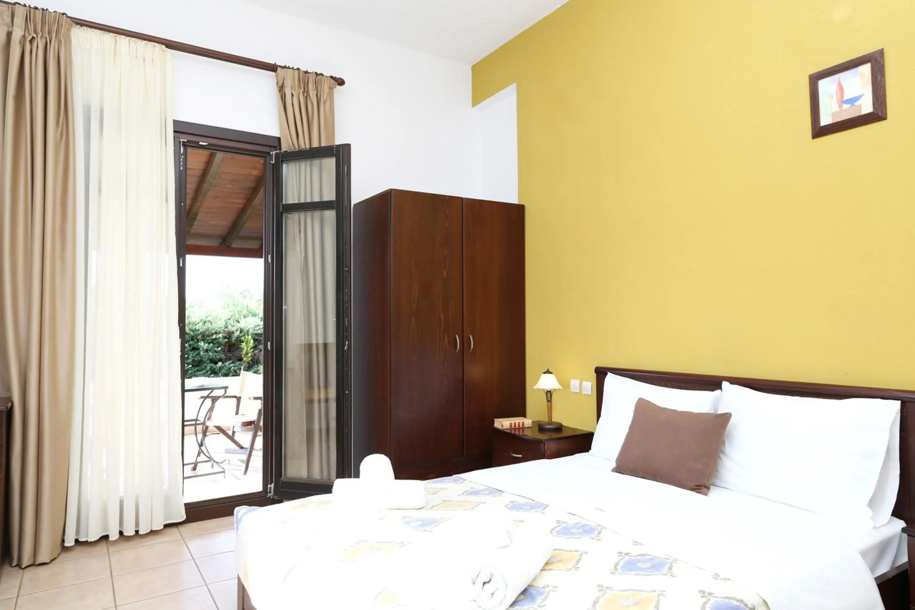 Bed in Palirria Hotel & Studios