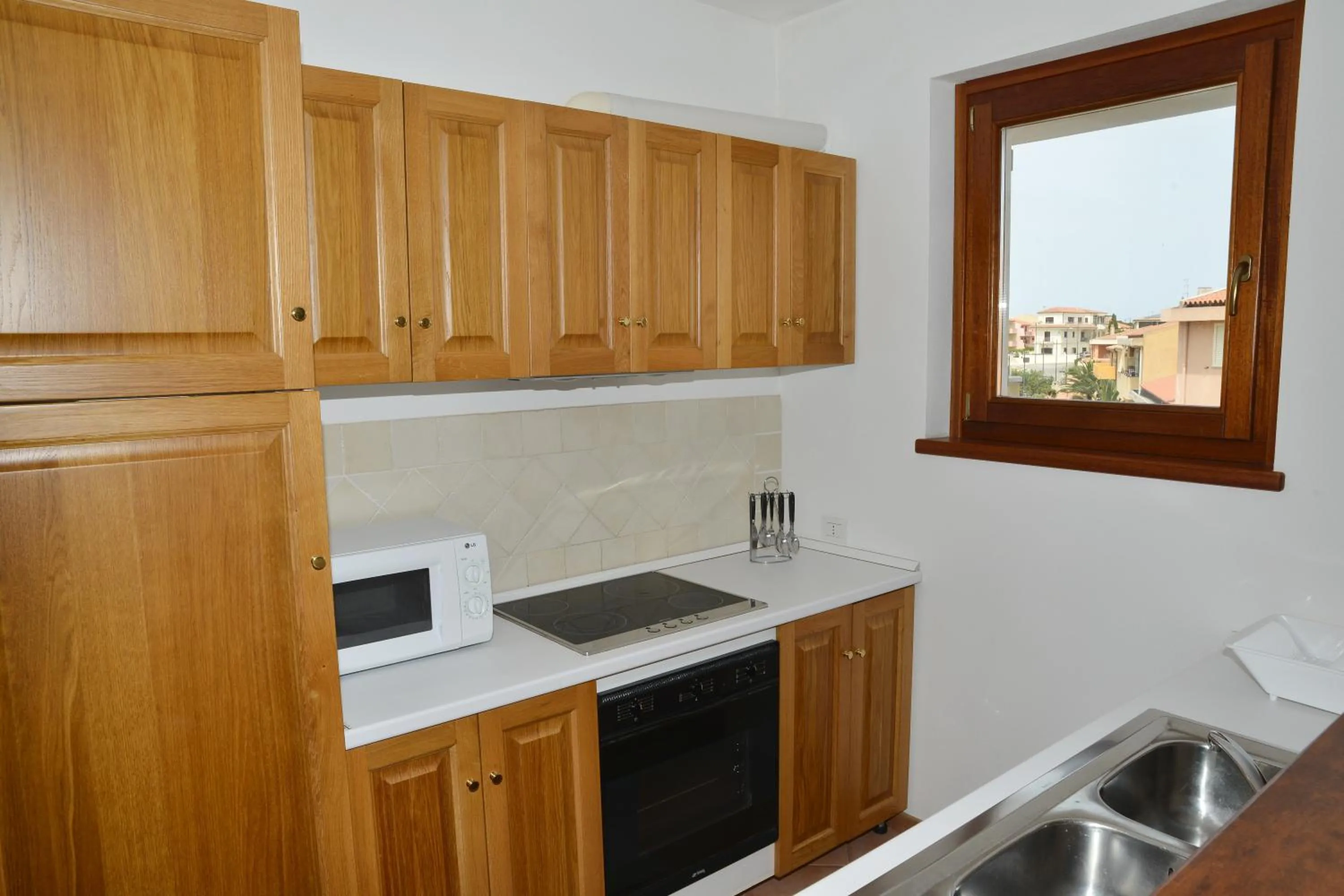 Kitchen or kitchenette in Appartamenti Galatea