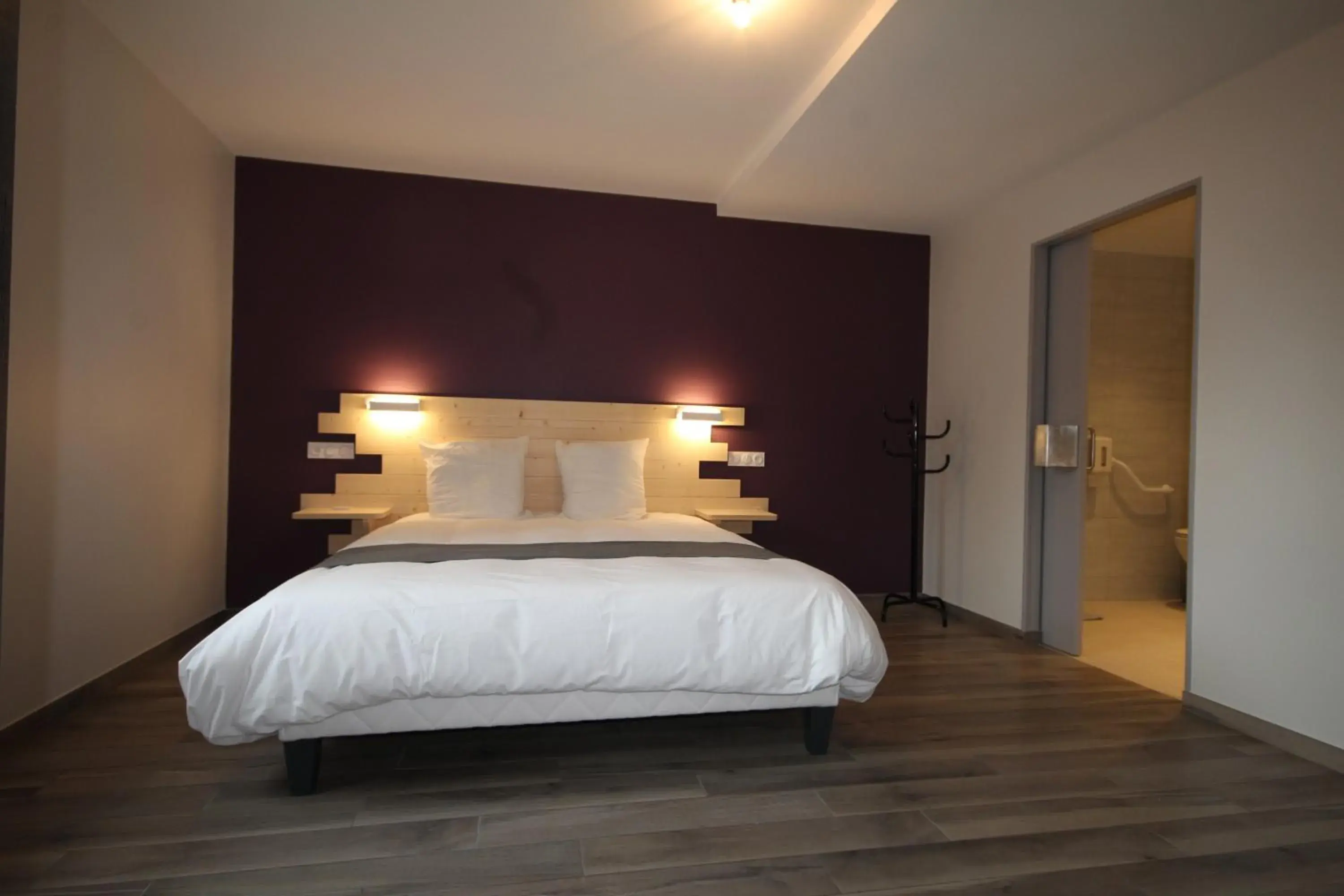 Bedroom, Bed in Logis hôtel restaurant Auberge de la Cloche Bedroom, Bed in Logis hôtel restaurant Auberge de la Cloche
