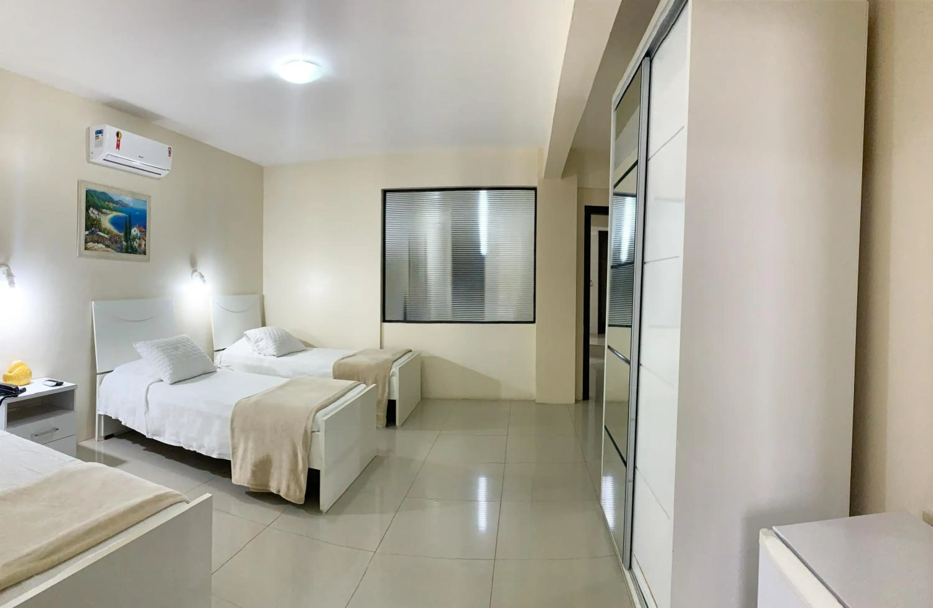 Bed in De Rose Palace Hotel