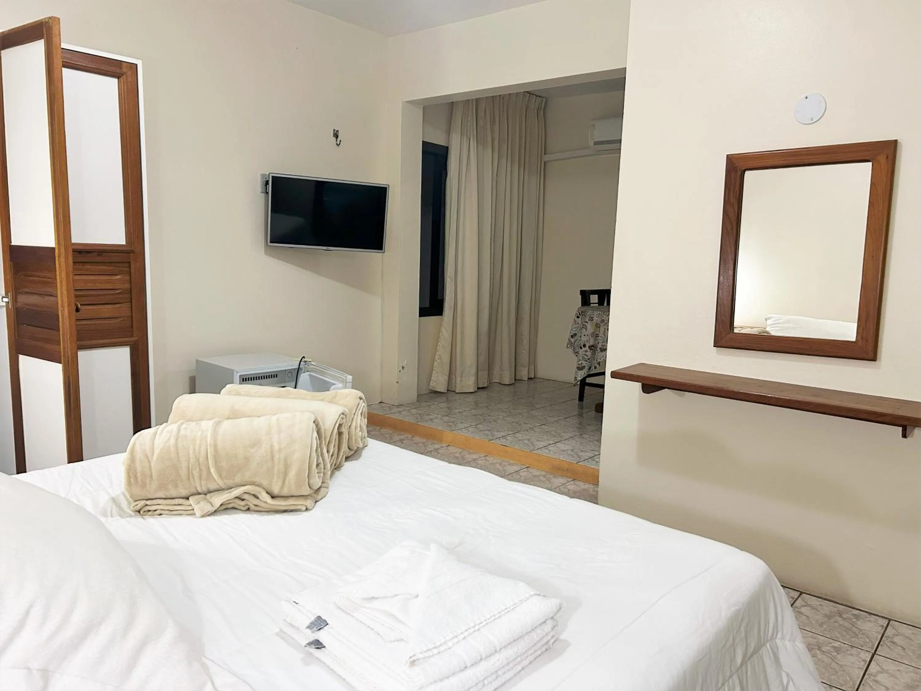 Bed in De Rose Palace Hotel