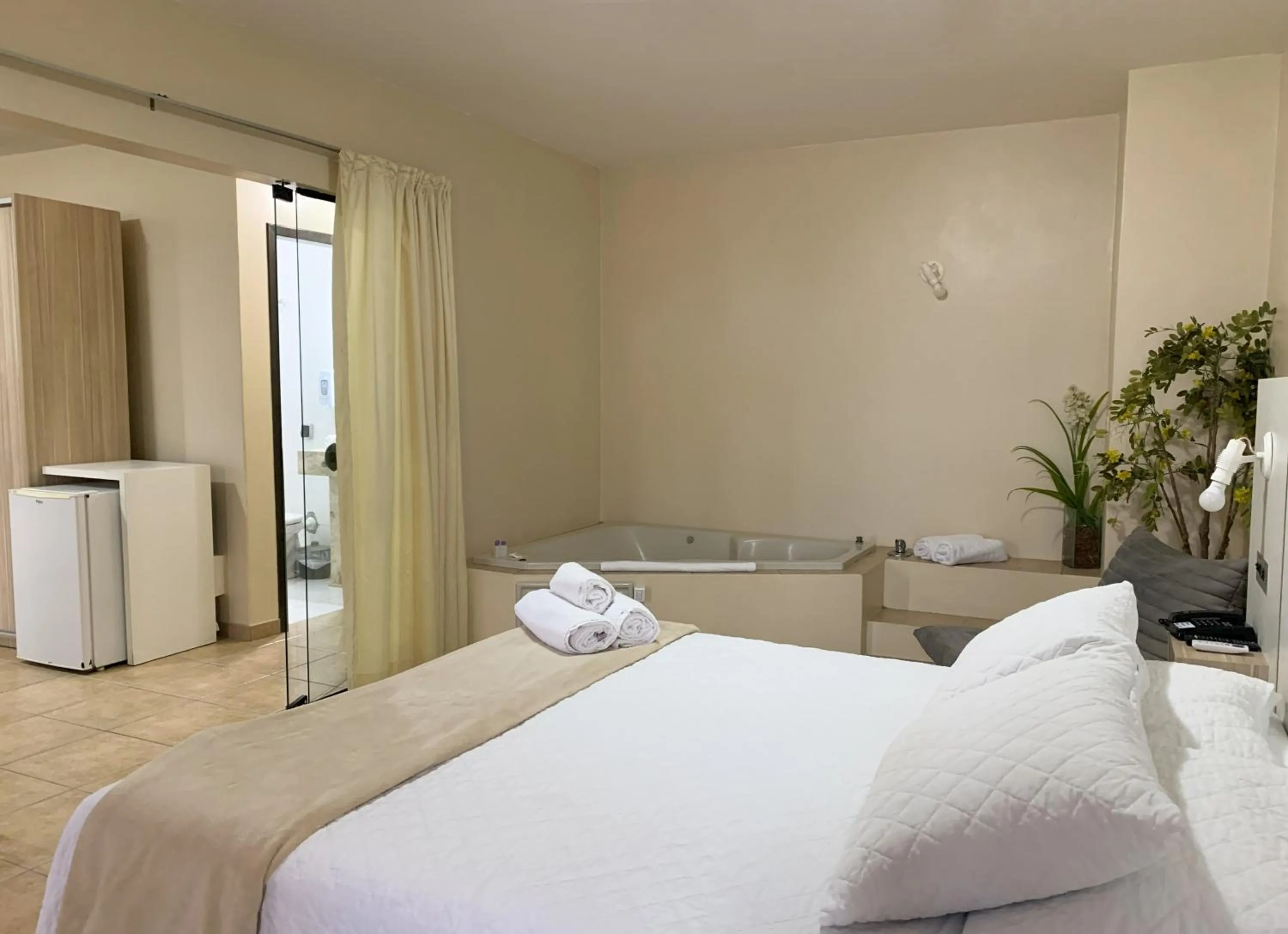 Bed in De Rose Palace Hotel