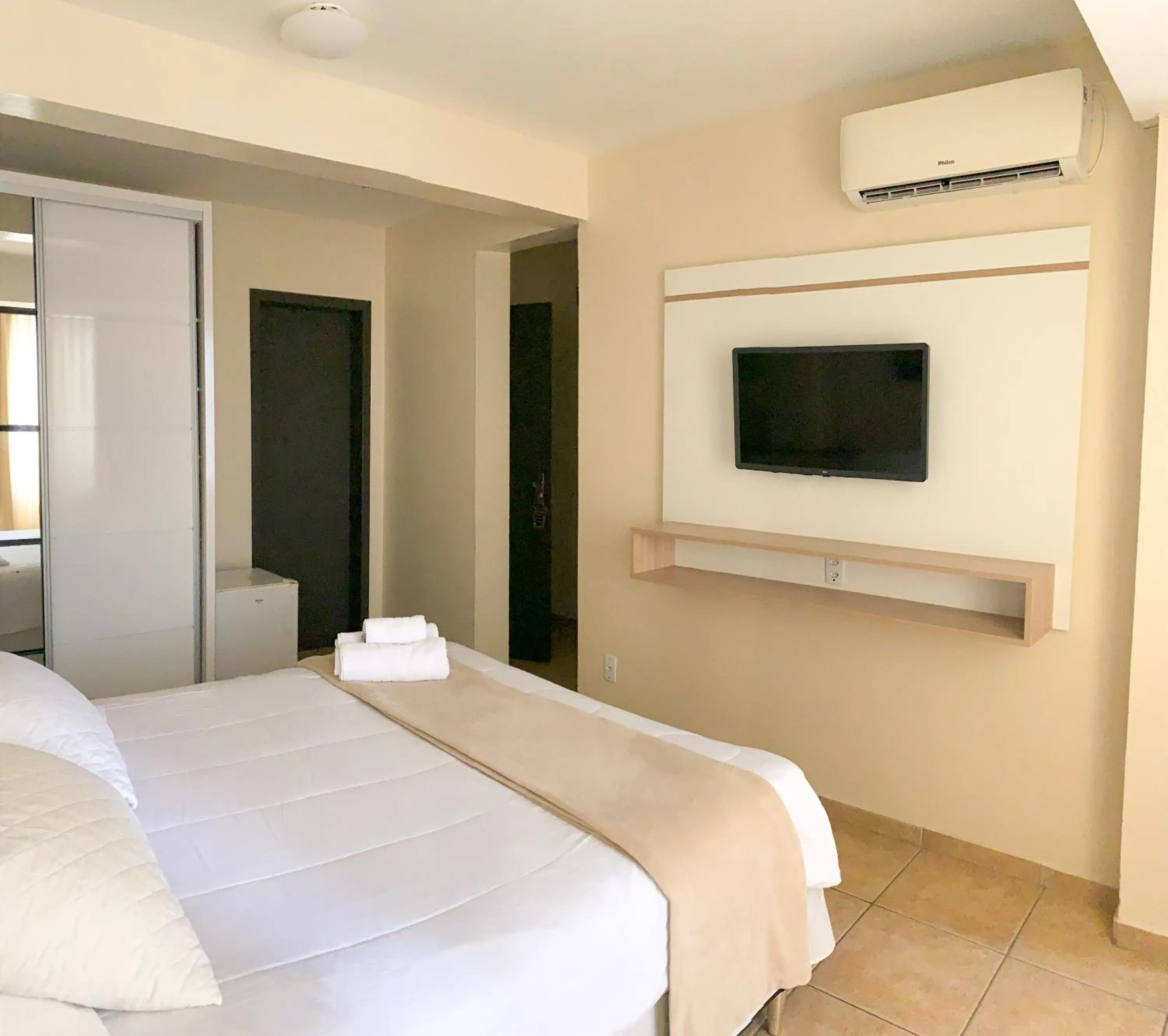 Bed in De Rose Palace Hotel