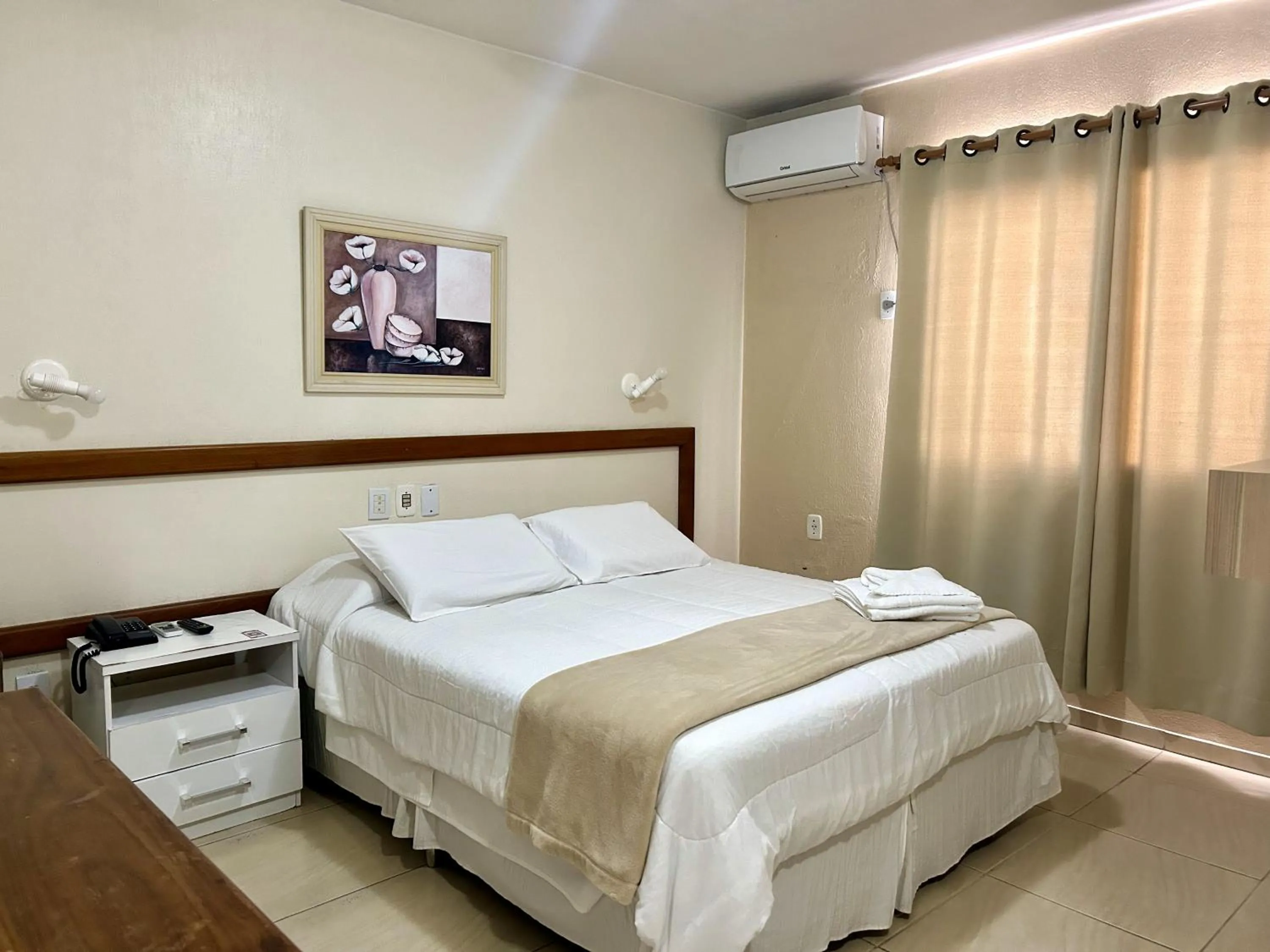 Bed in De Rose Palace Hotel