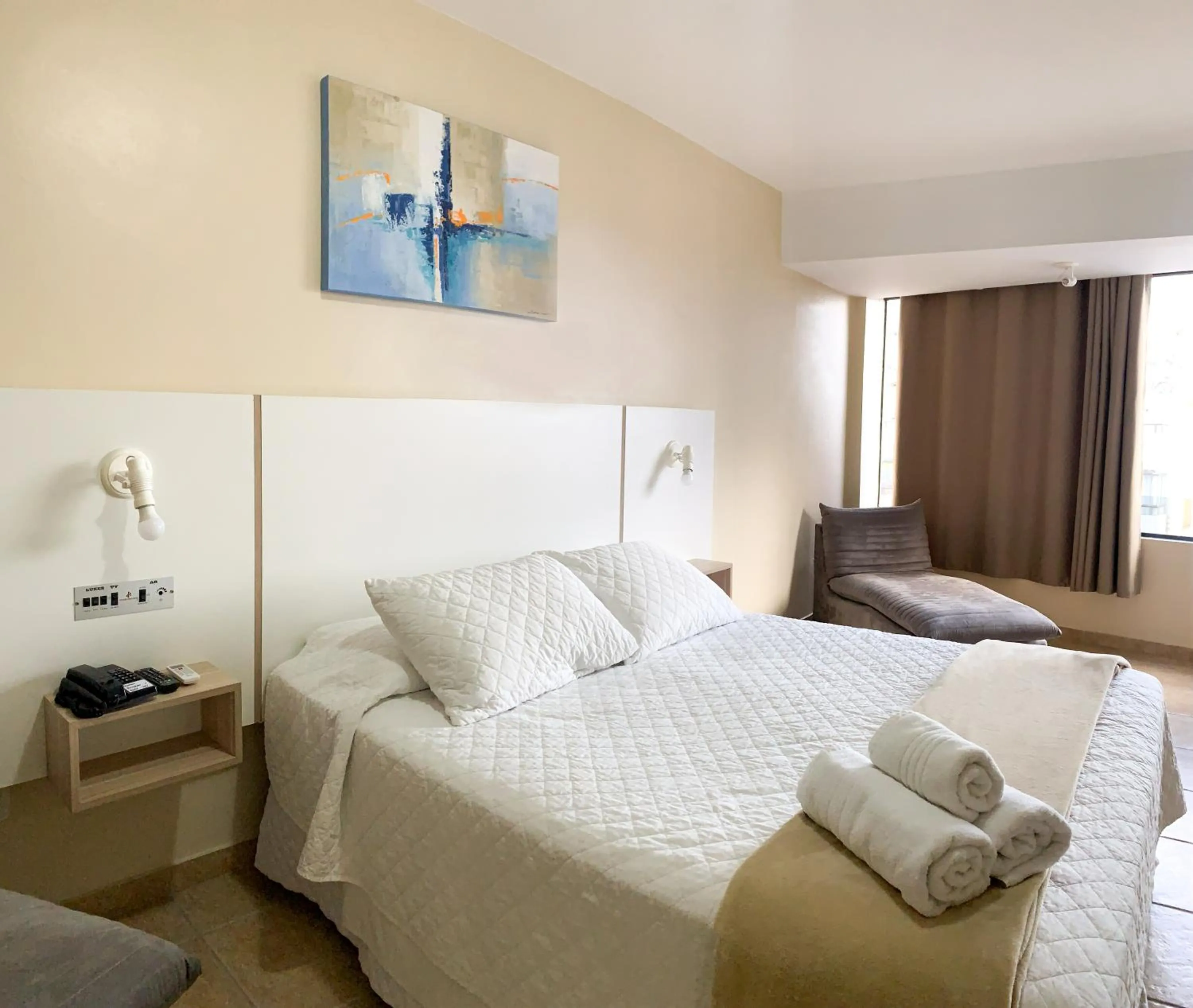 Bed in De Rose Palace Hotel