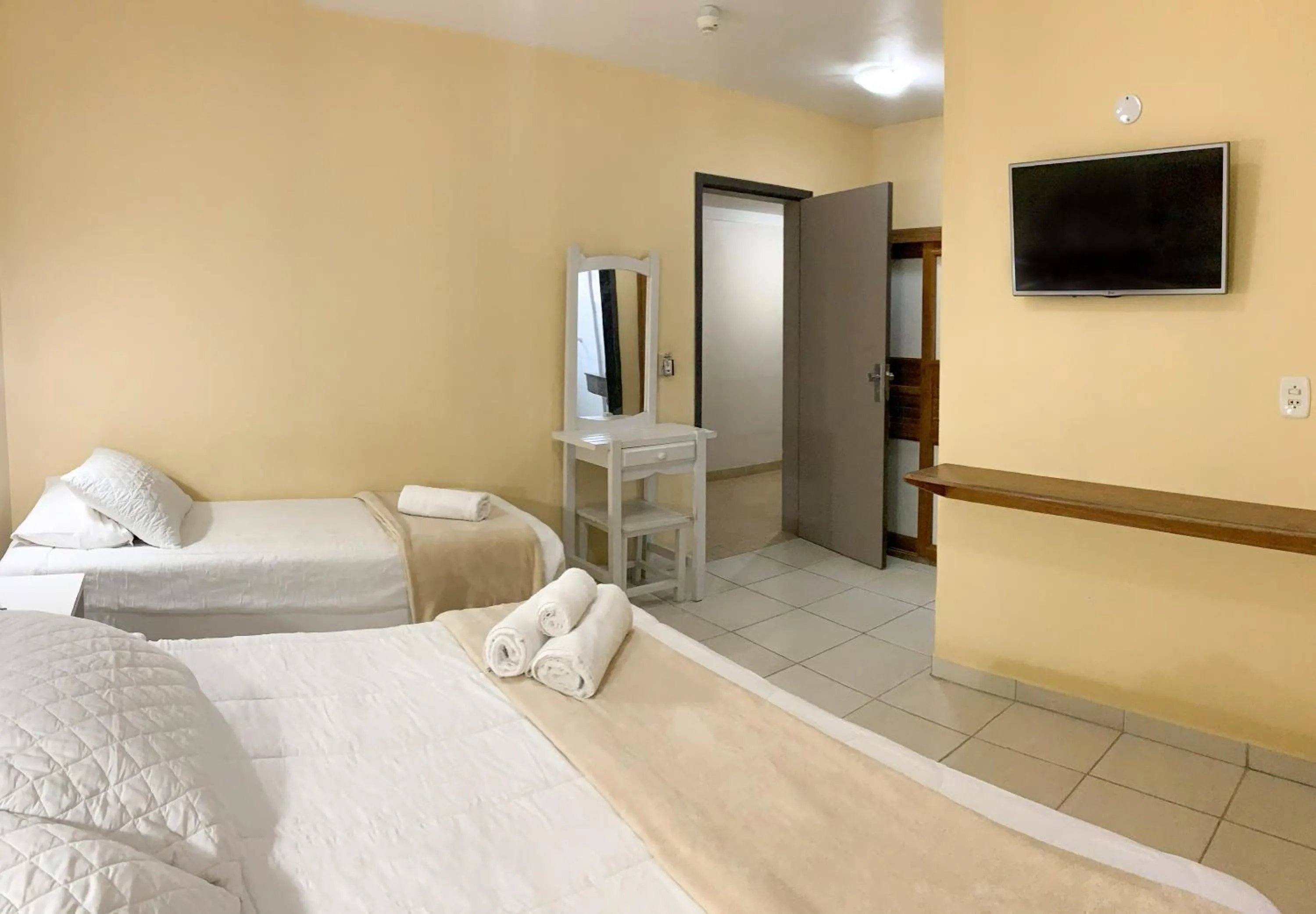 Bed in De Rose Palace Hotel