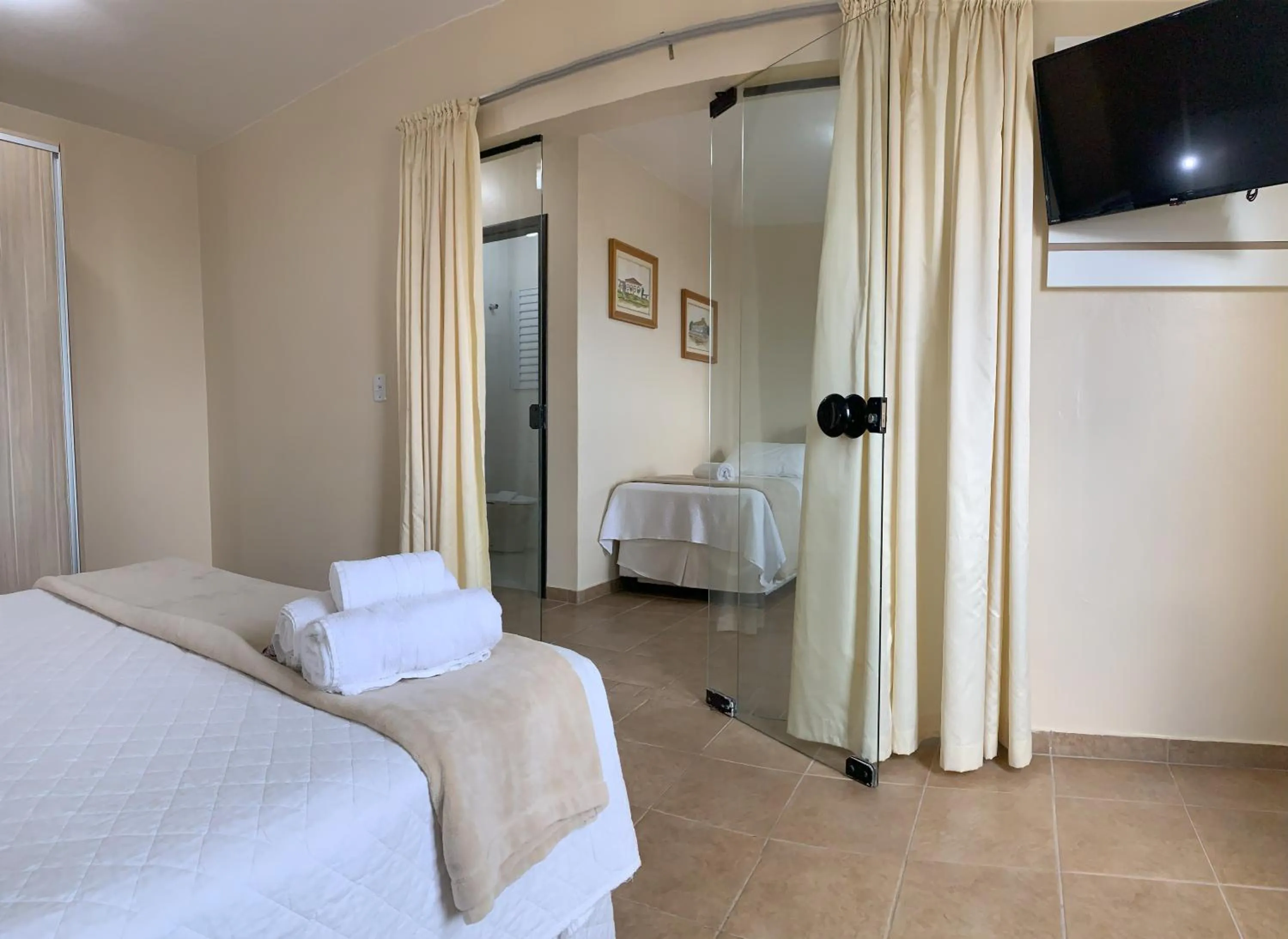 Bed in De Rose Palace Hotel