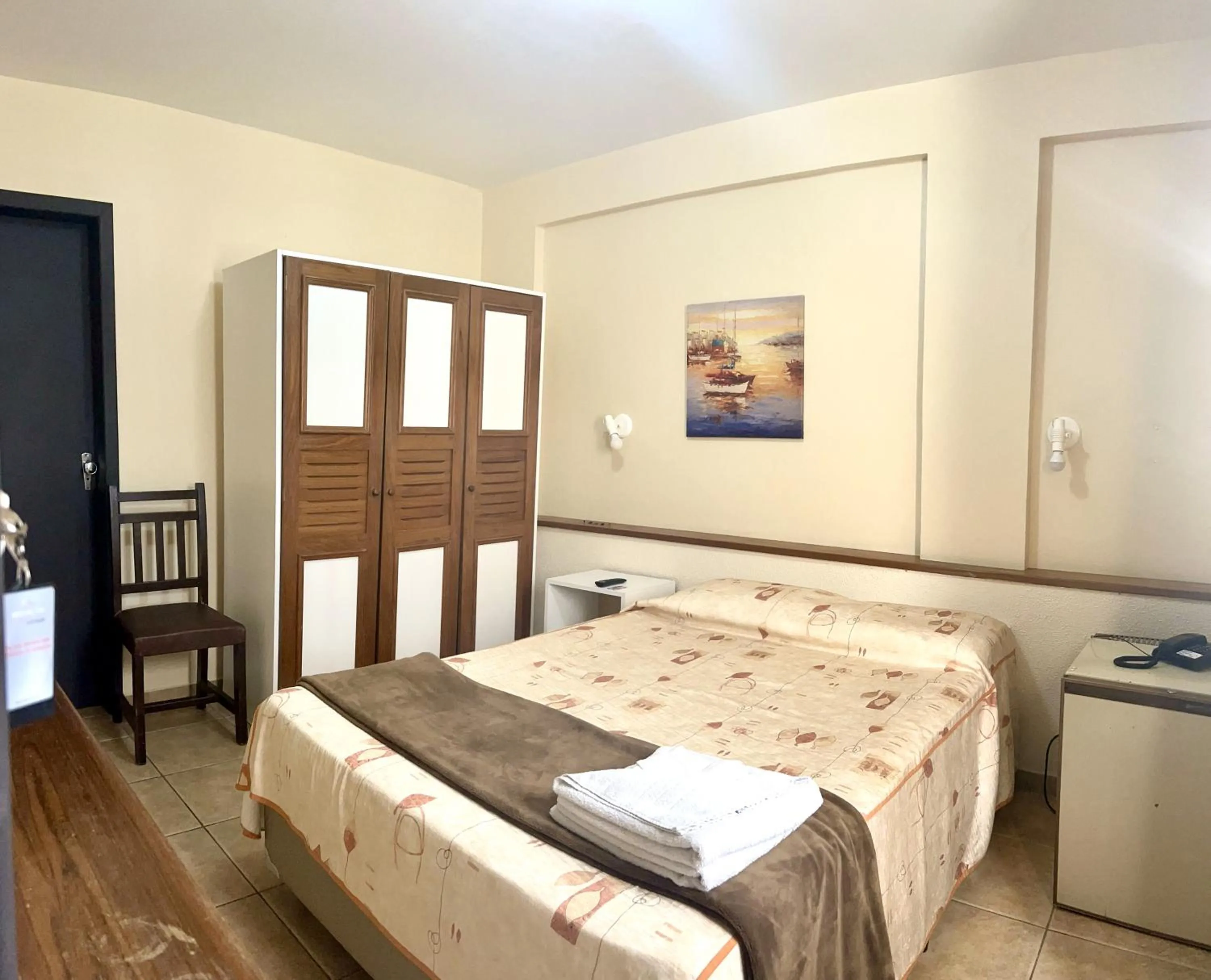 Bed in De Rose Palace Hotel