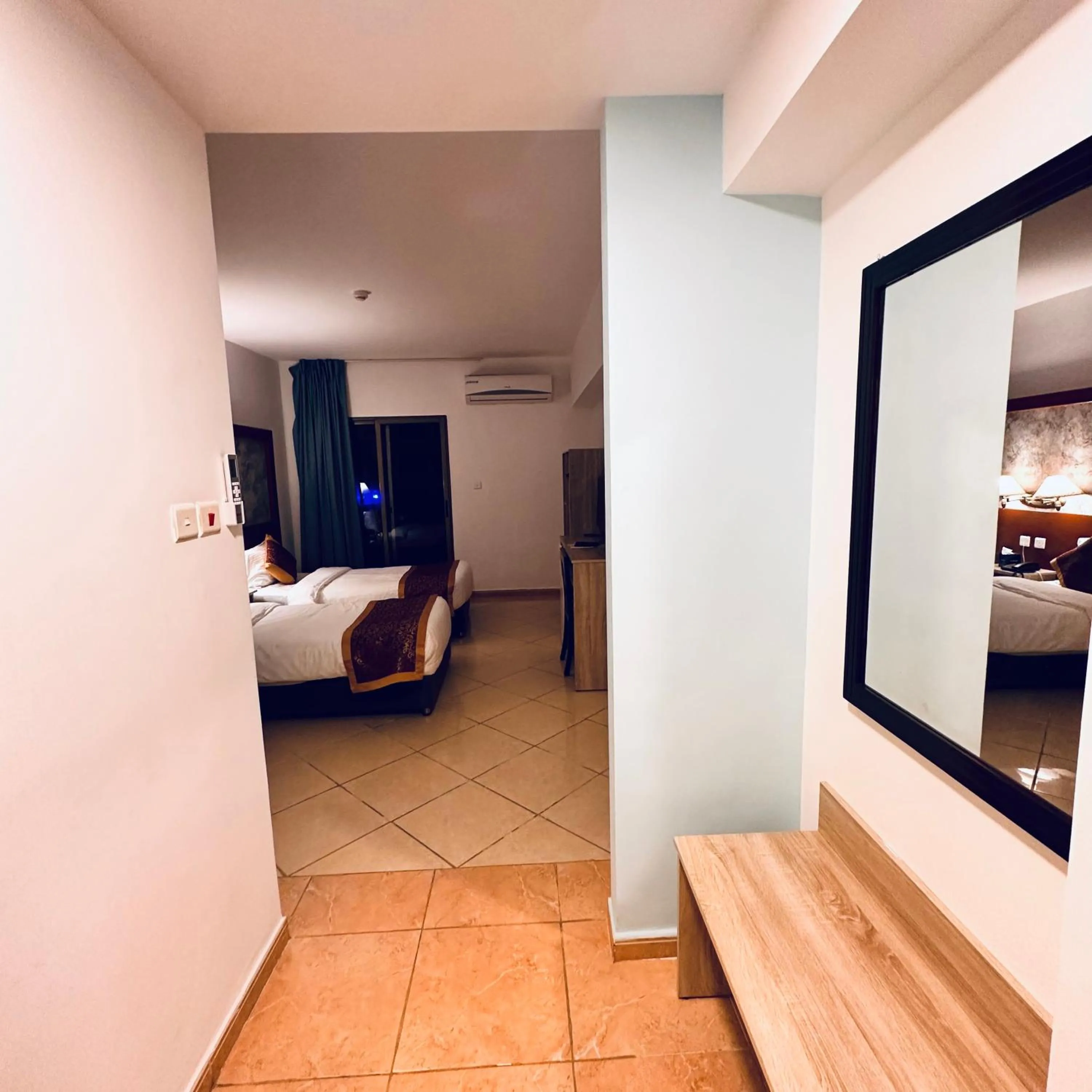 Bed in Aquavista Hotel & Suites