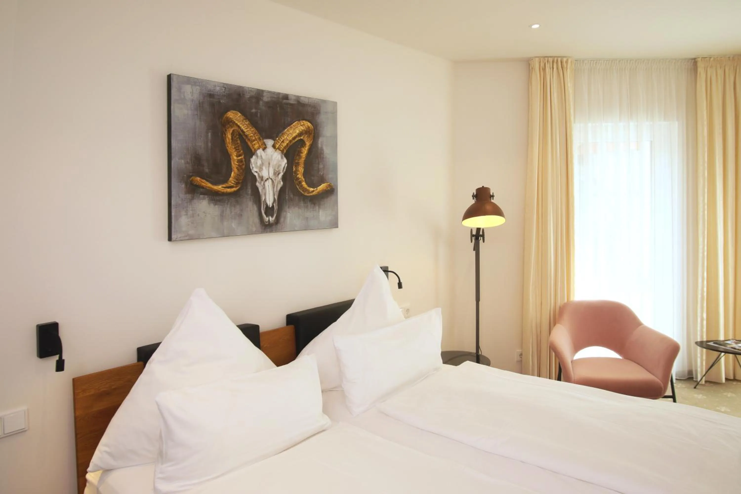 Bed in Romantik Hotel Landhaus Biewald