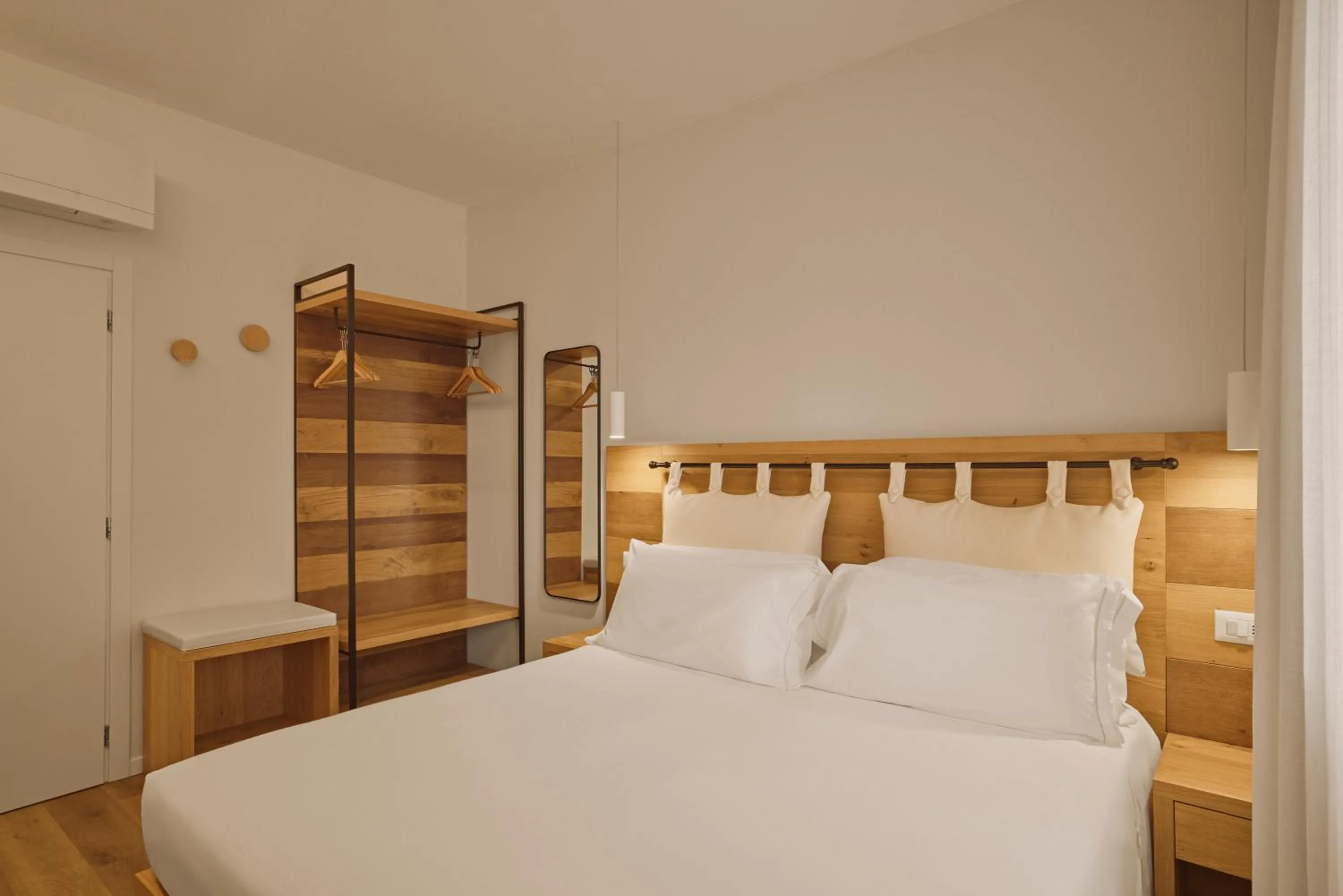 Bed in Hotel Le Mura