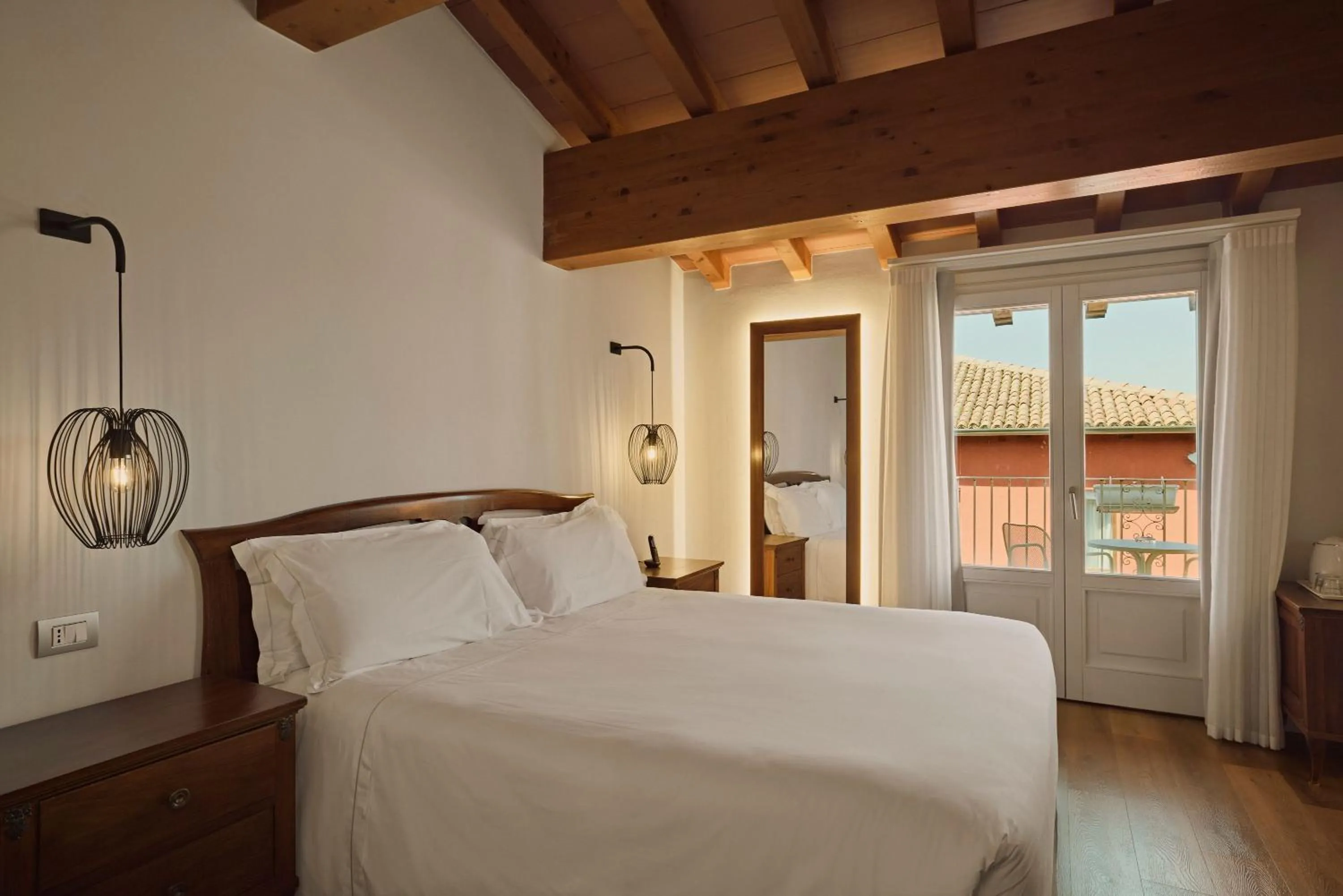 Bed in Hotel Le Mura