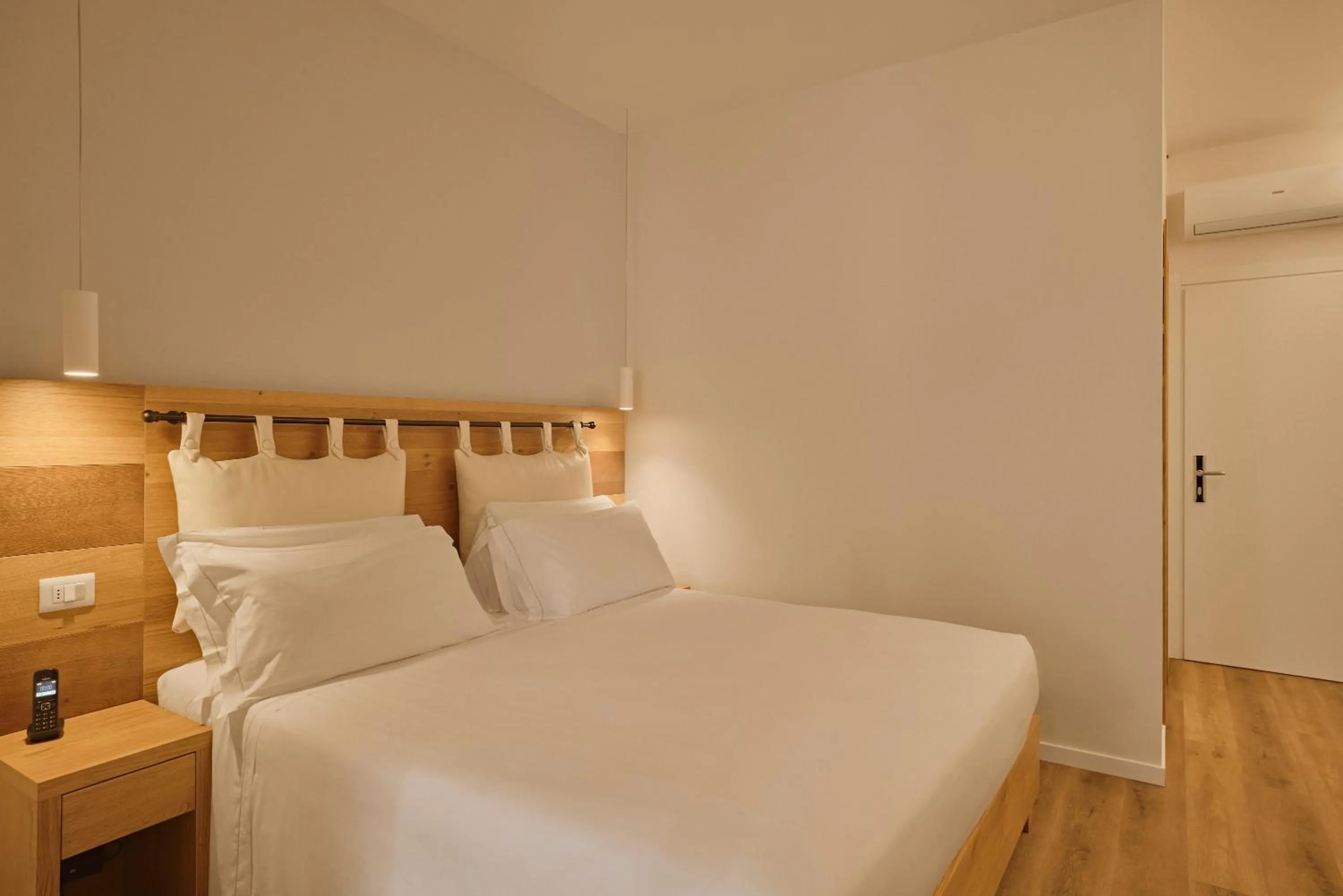 Bed in Hotel Le Mura