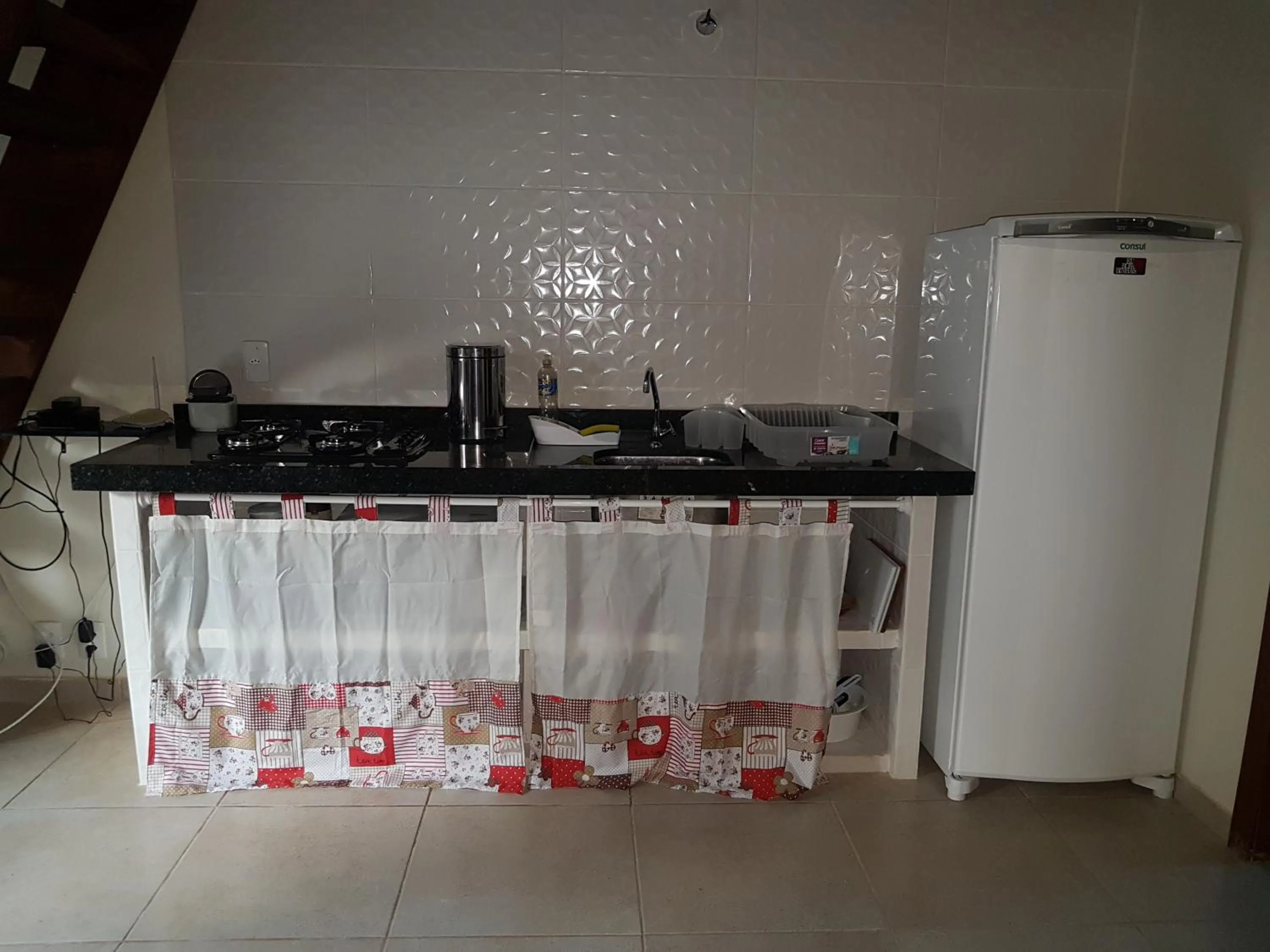 Communal kitchen in Vila Figueiredo das Donas